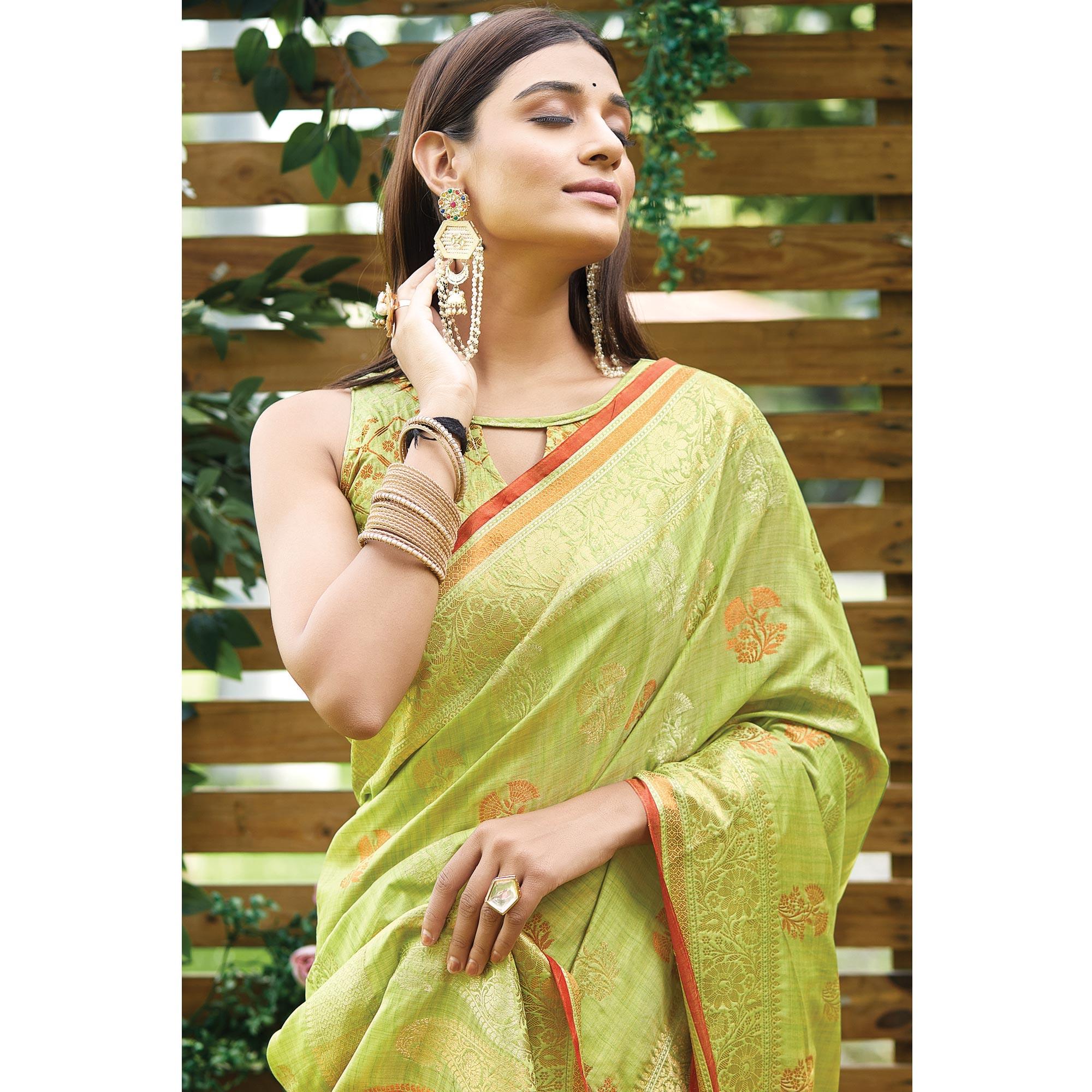 Green Woven Raw Silk Saree With Tassels - Peachmode