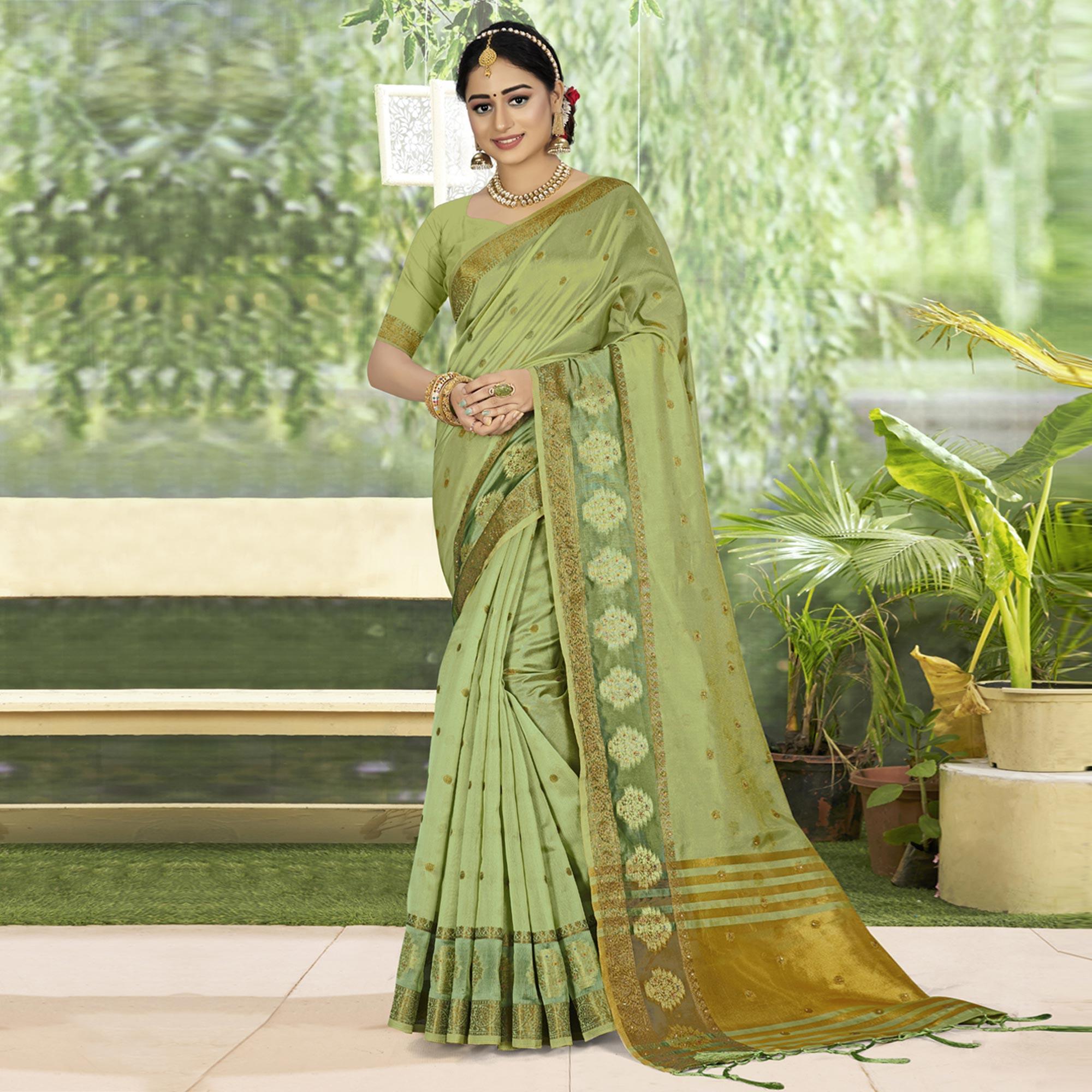 Green Woven With Embellished Organza Saree With Tassels - Peachmode