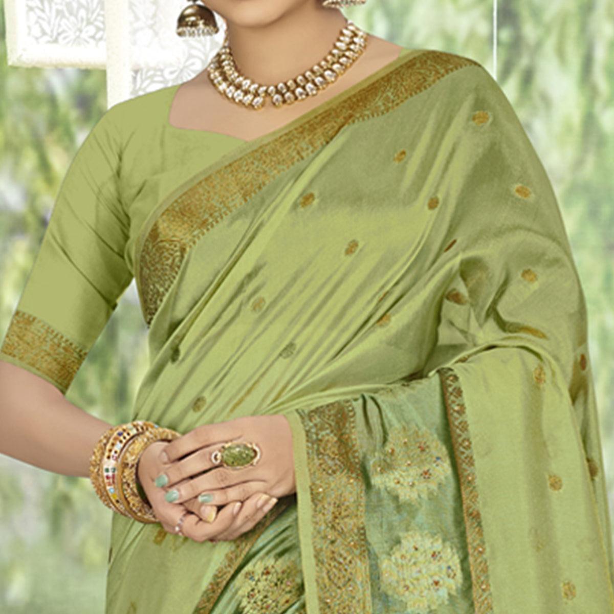 Green Woven With Embellished Organza Saree With Tassels - Peachmode