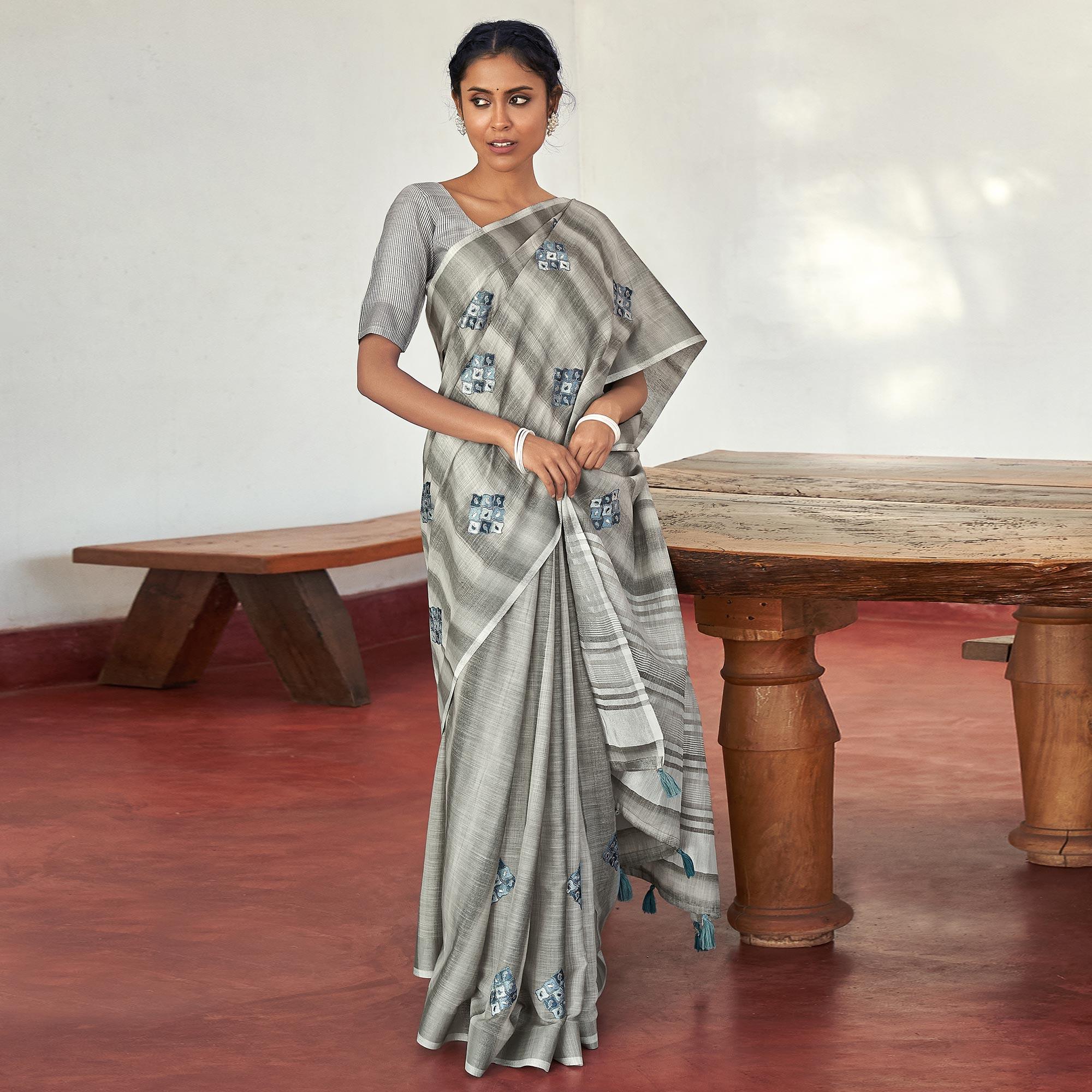 Grey Casual Wear Embroidered Linen Saree With Tassels - Peachmode