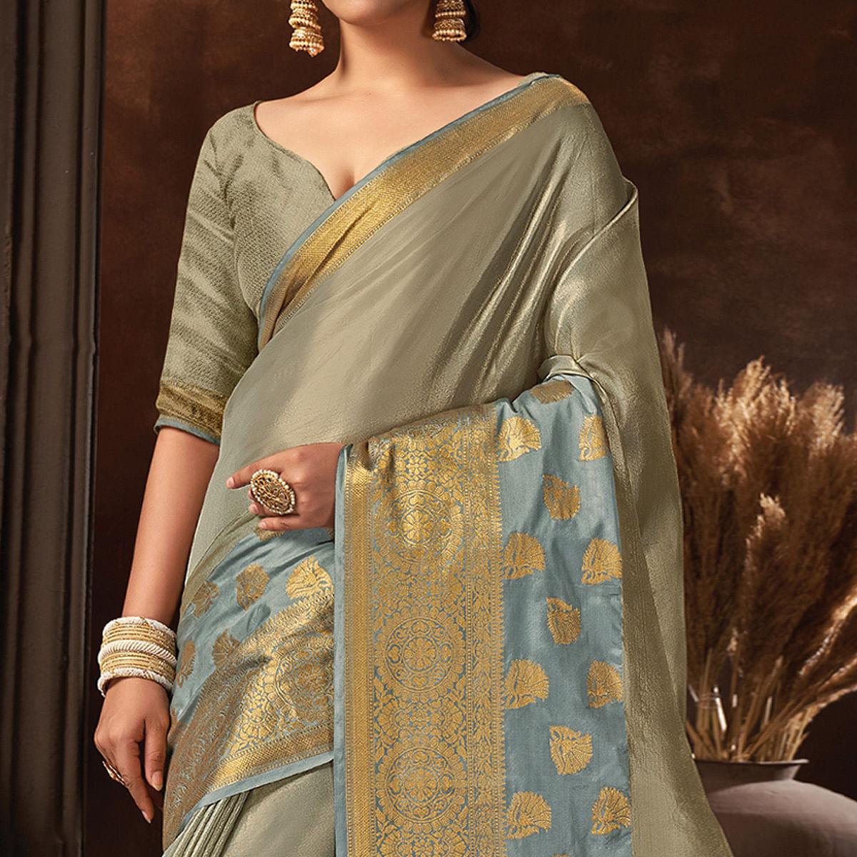 Grey Festive Wear Solid Organza Saree With Tassels - Peachmode