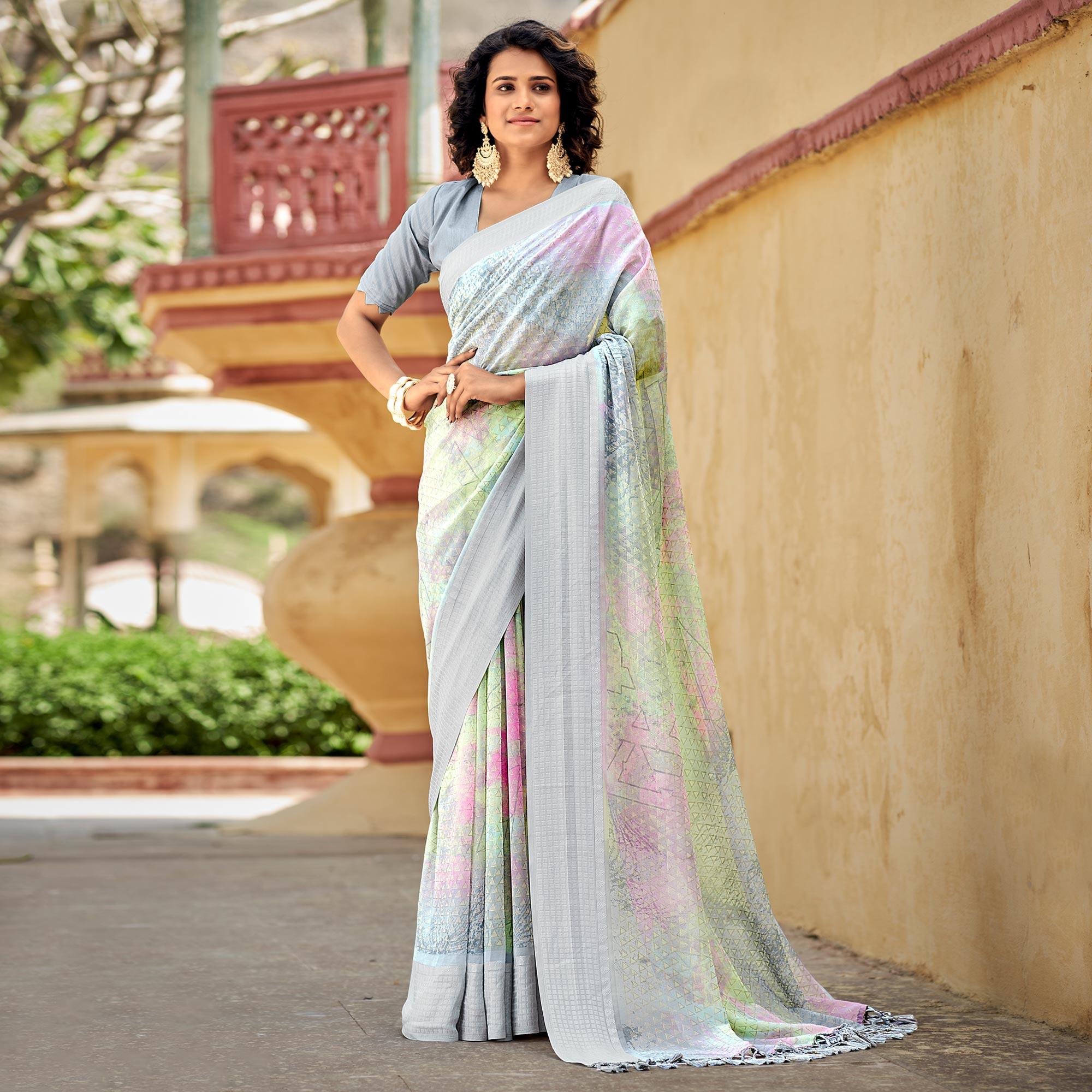 Grey Printed Georgette Saree With Tassels - Peachmode