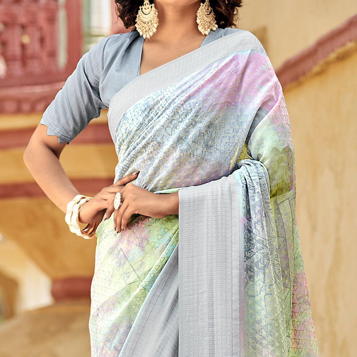 Grey Printed Georgette Saree With Tassels - Peachmode
