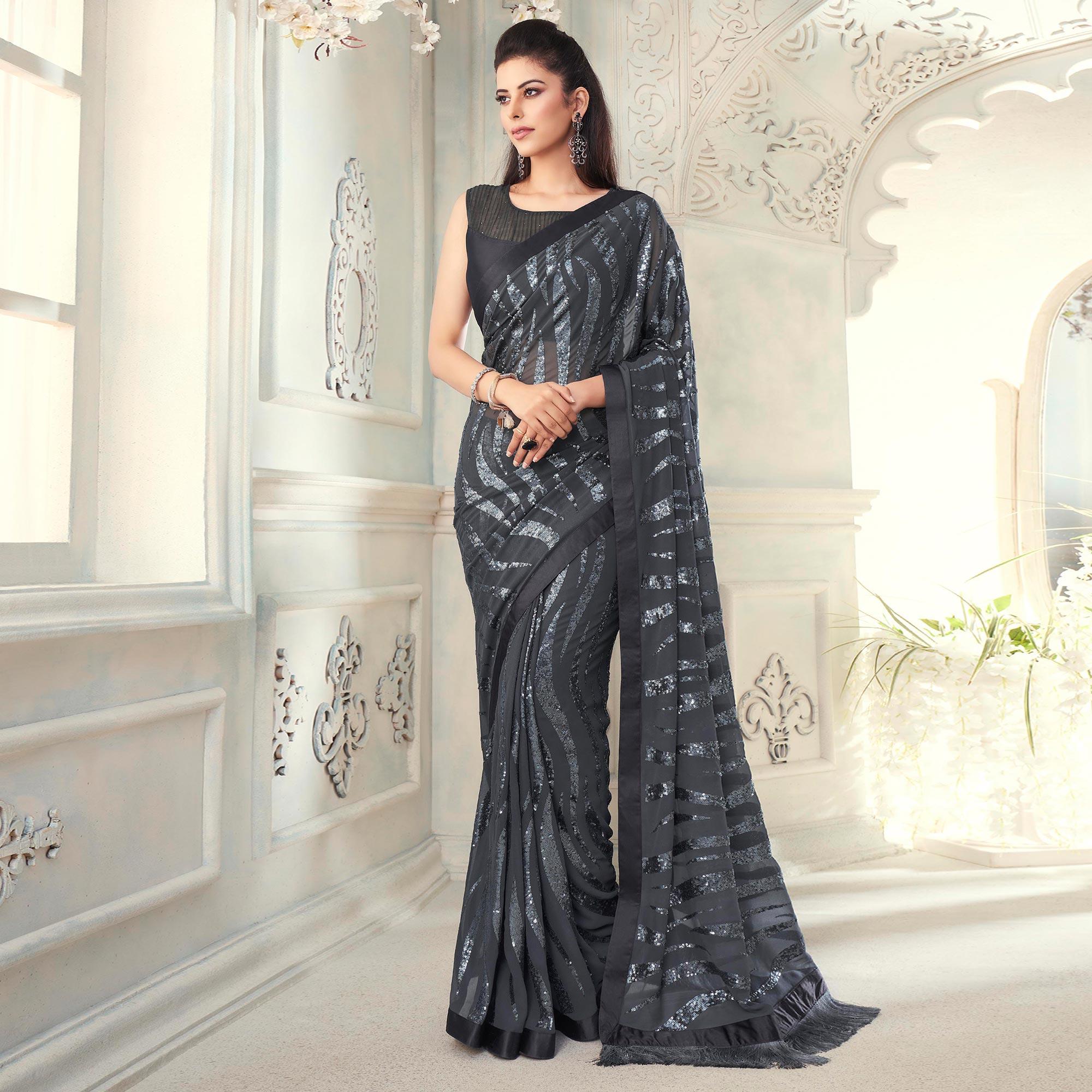 Grey Sequence Embroidered Georgette Saree With Tassels - Peachmode