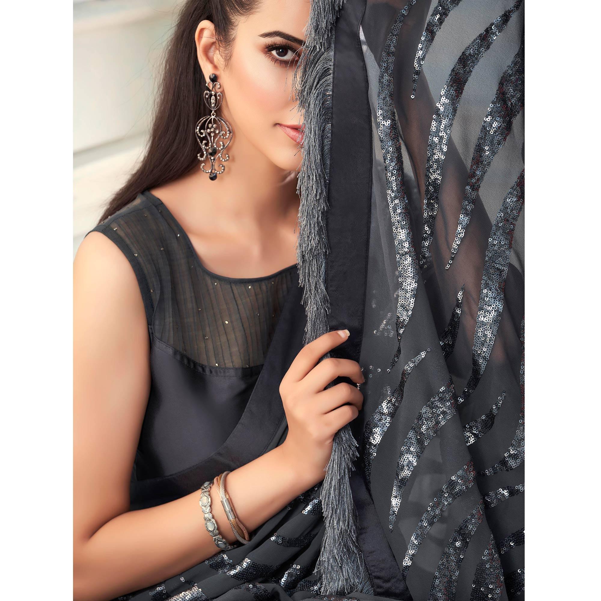 Grey Sequence Embroidered Georgette Saree With Tassels - Peachmode