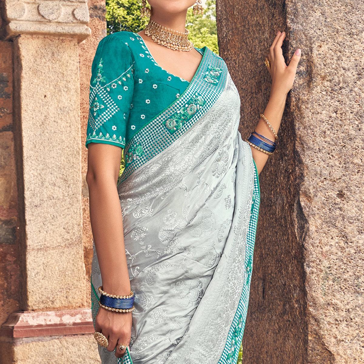 Grey Woven Banarasi Silk Saree With Tassels - Peachmode