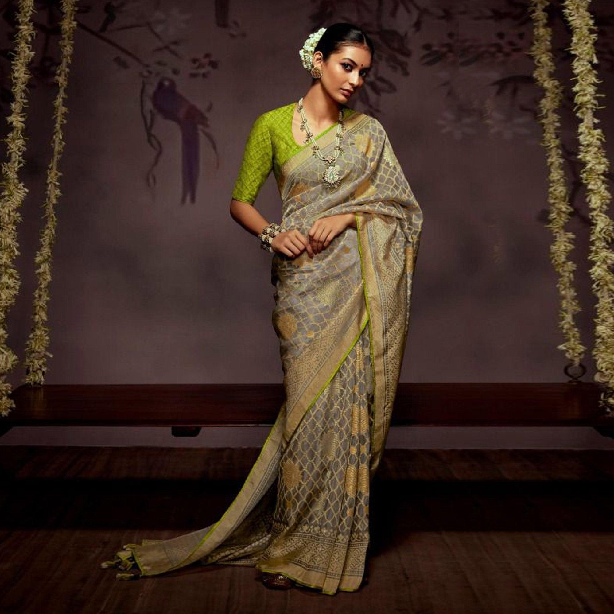 Grey Woven Brasso Saree With Tassels - Peachmode