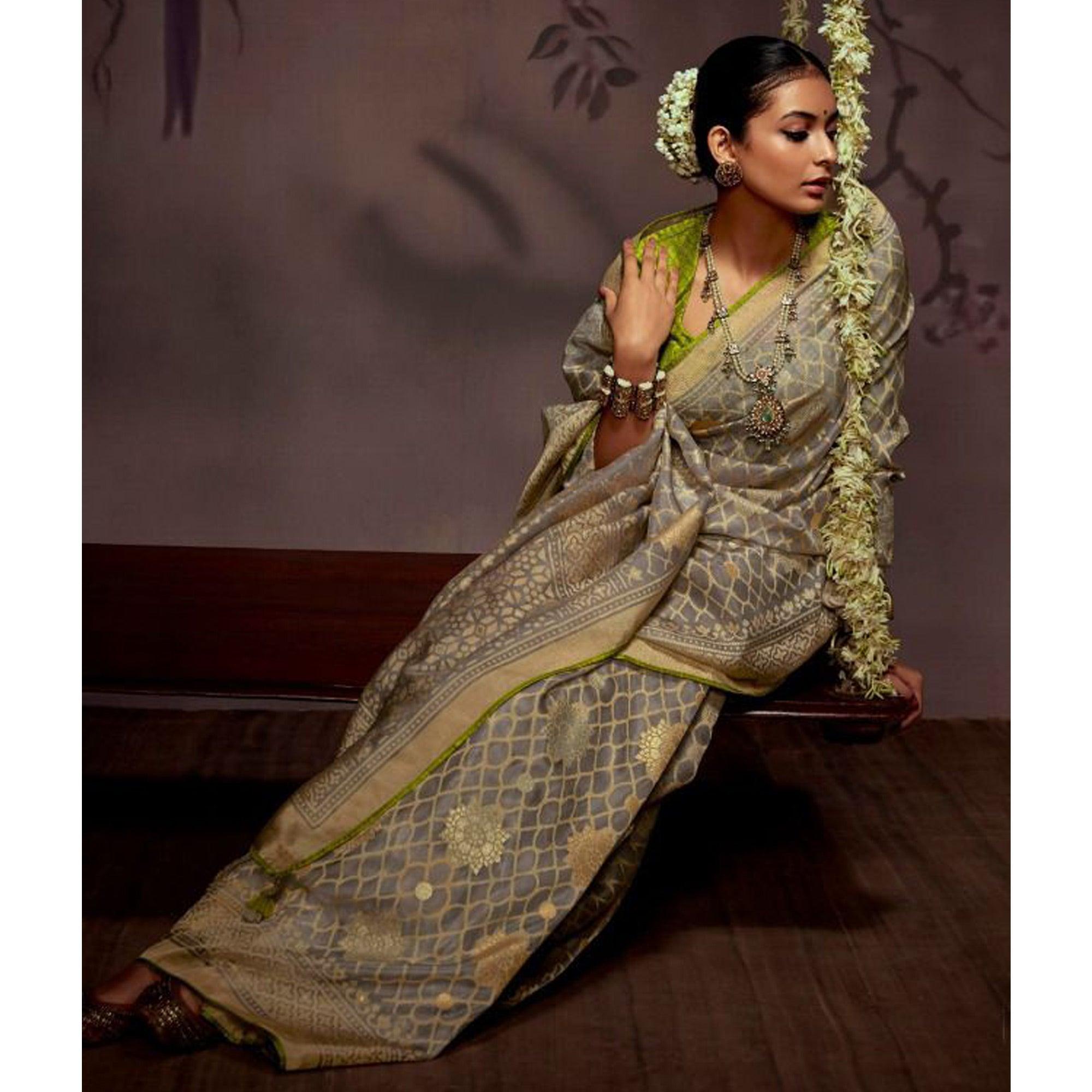 Grey Woven Brasso Saree With Tassels - Peachmode