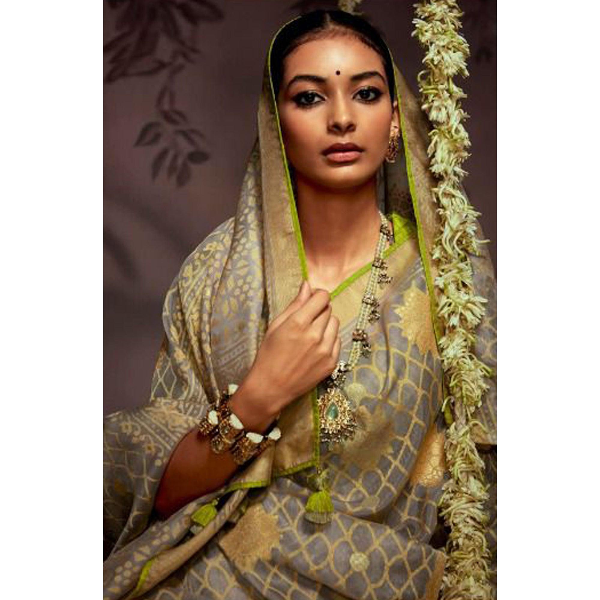 Grey Woven Brasso Saree With Tassels - Peachmode