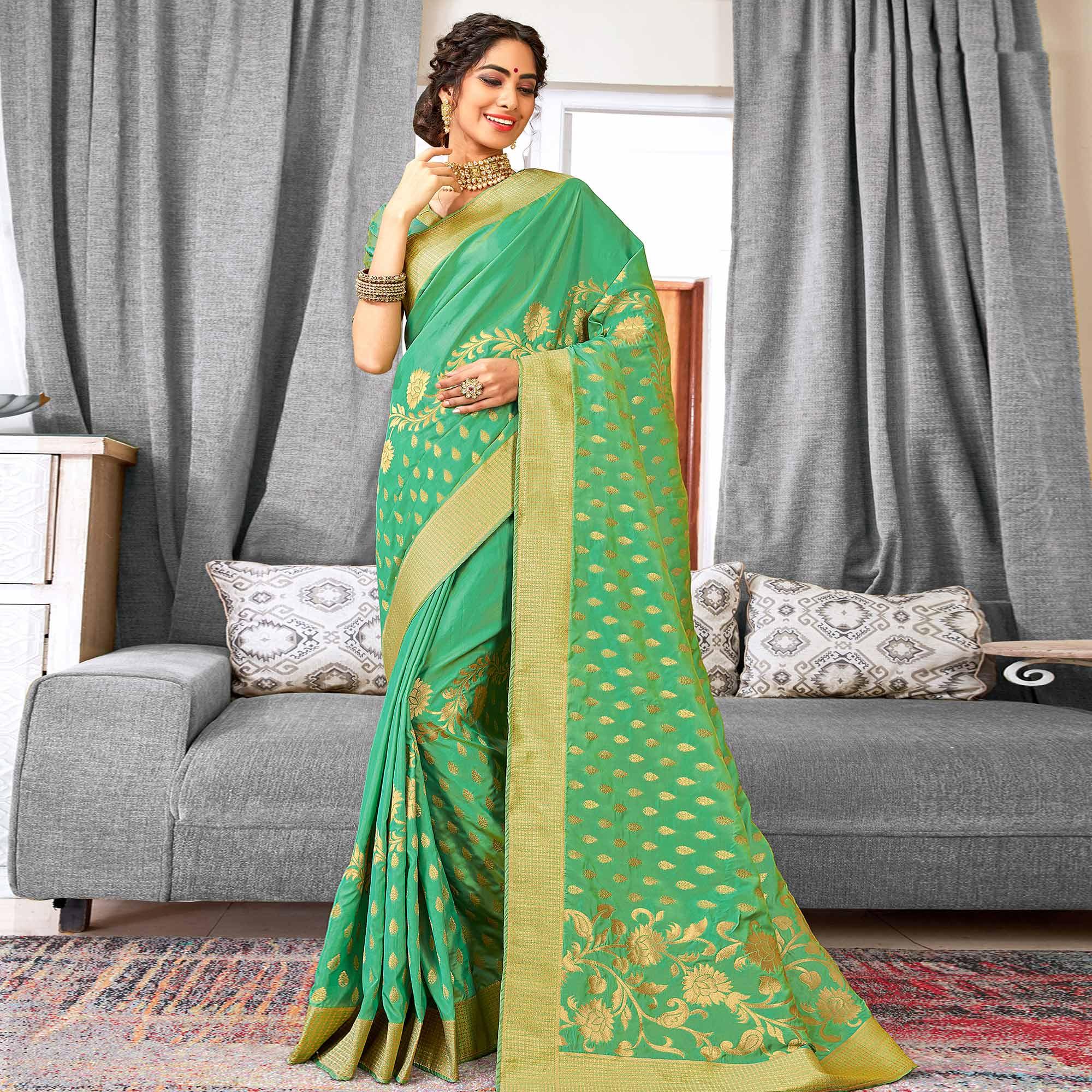 Groovy Turquoise Green Colored Festive Wear Woven Silk Saree - Peachmode