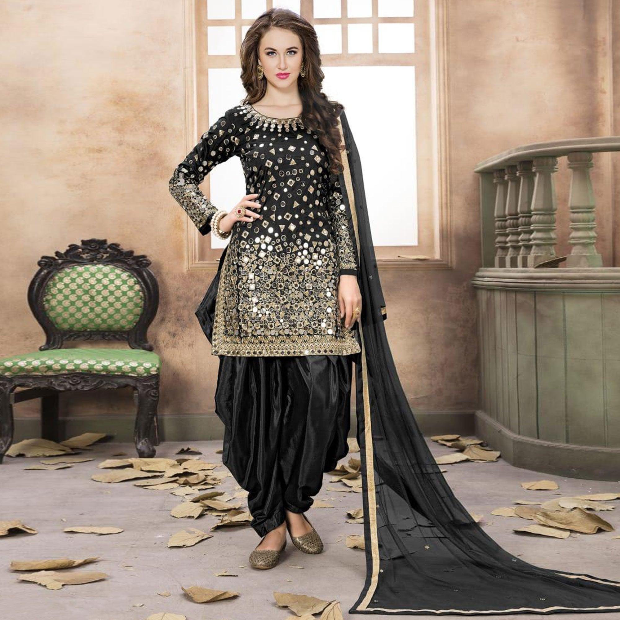 Hypnotic Black Colored Partywear Embroidered Tapeta Silk Patiala Suit - Peachmode
