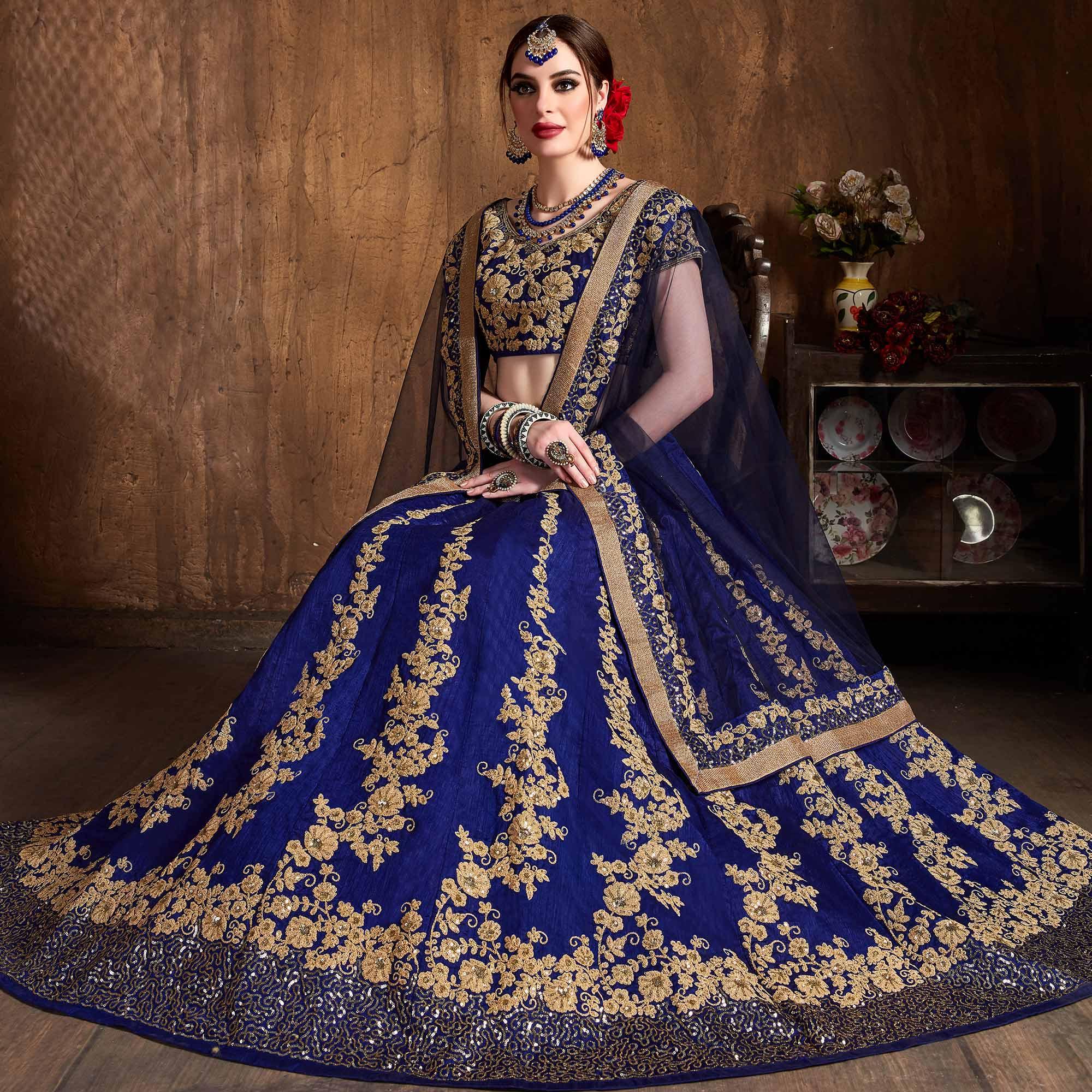 Hypnotic Blue Colored Designer Partywear Raw Silk Lehenga Choli - Peachmode