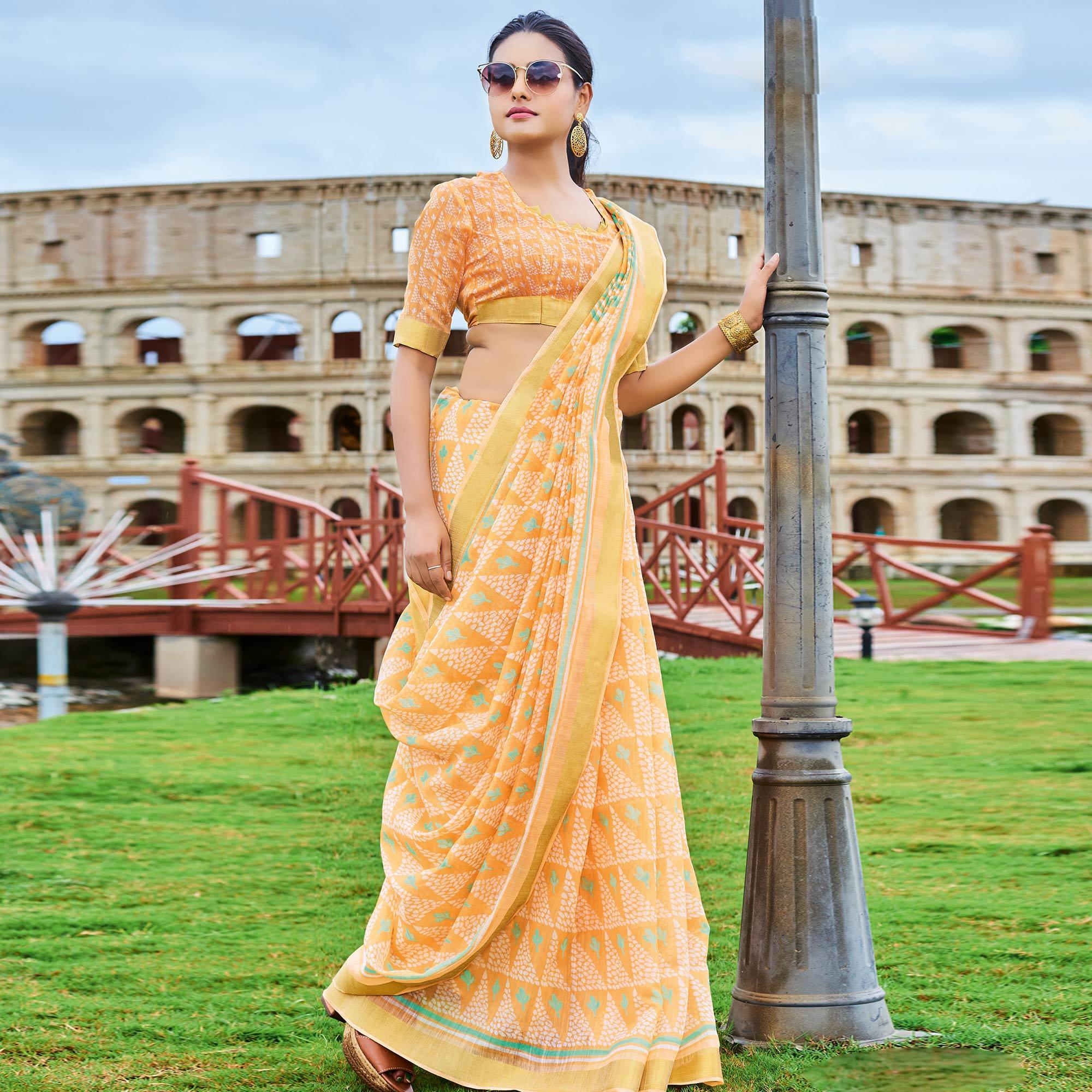 Hypnotic Light Orange Colored Casual Wear Printed Cotton Saree - Peachmode