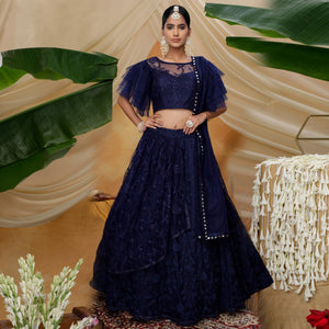 Hypnotic Navy Blue Colored Designer Partywear Embroidered Net Lehenga Choli - Peachmode
