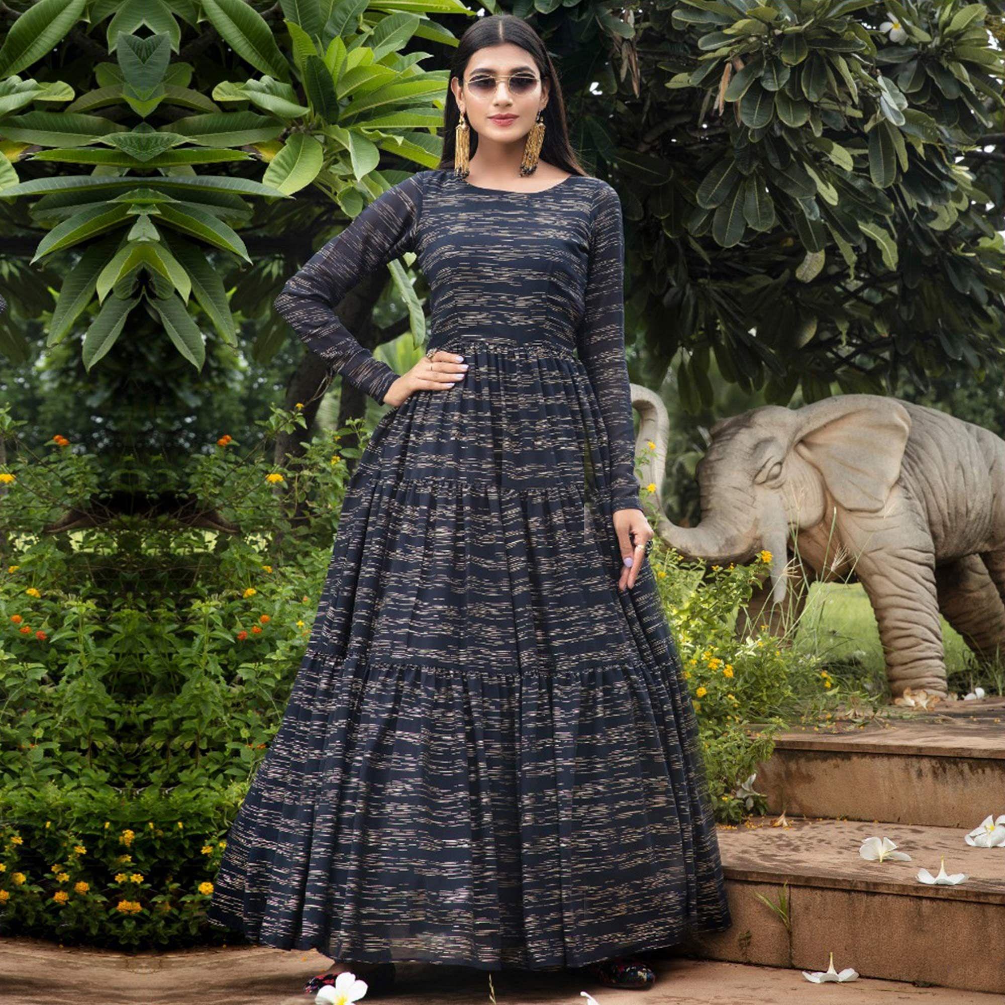 Hypnotic Navy Blue Colored Party Wear Foil Printed Georgette Gown - Peachmode