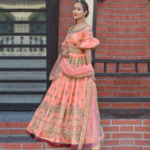 Hypnotic Peach Colored Party Wear Embroidered Silk Lehenga Choli - Peachmode