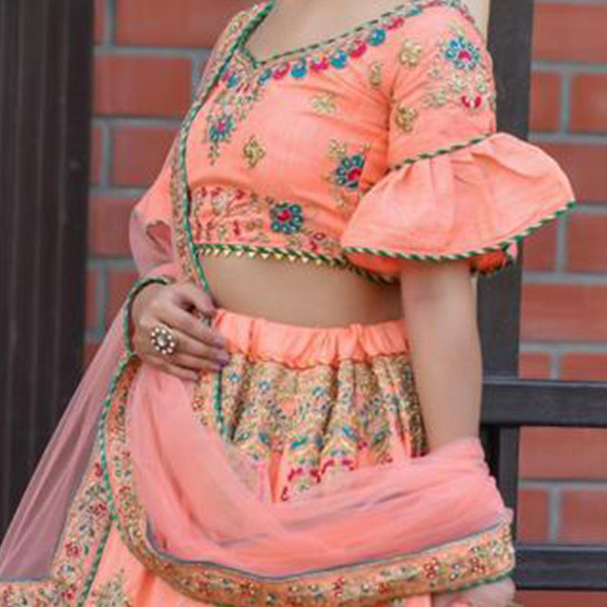 Hypnotic Peach Colored Party Wear Embroidered Silk Lehenga Choli - Peachmode