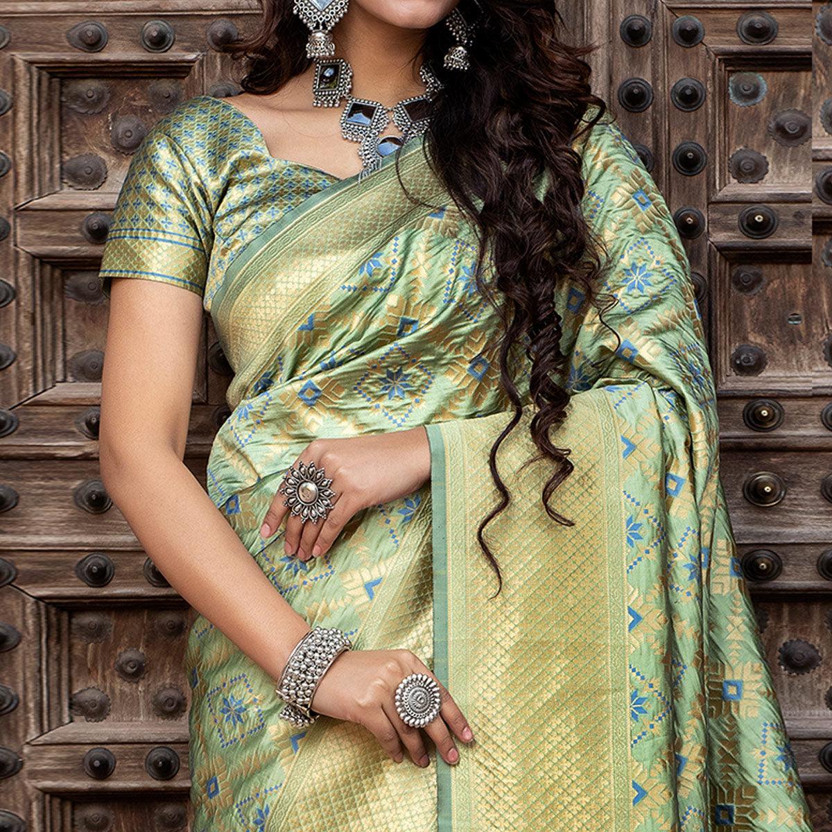 Hypnotic Pista Green Colored Festive Wear Woven Banarasi Silk Saree - Peachmode