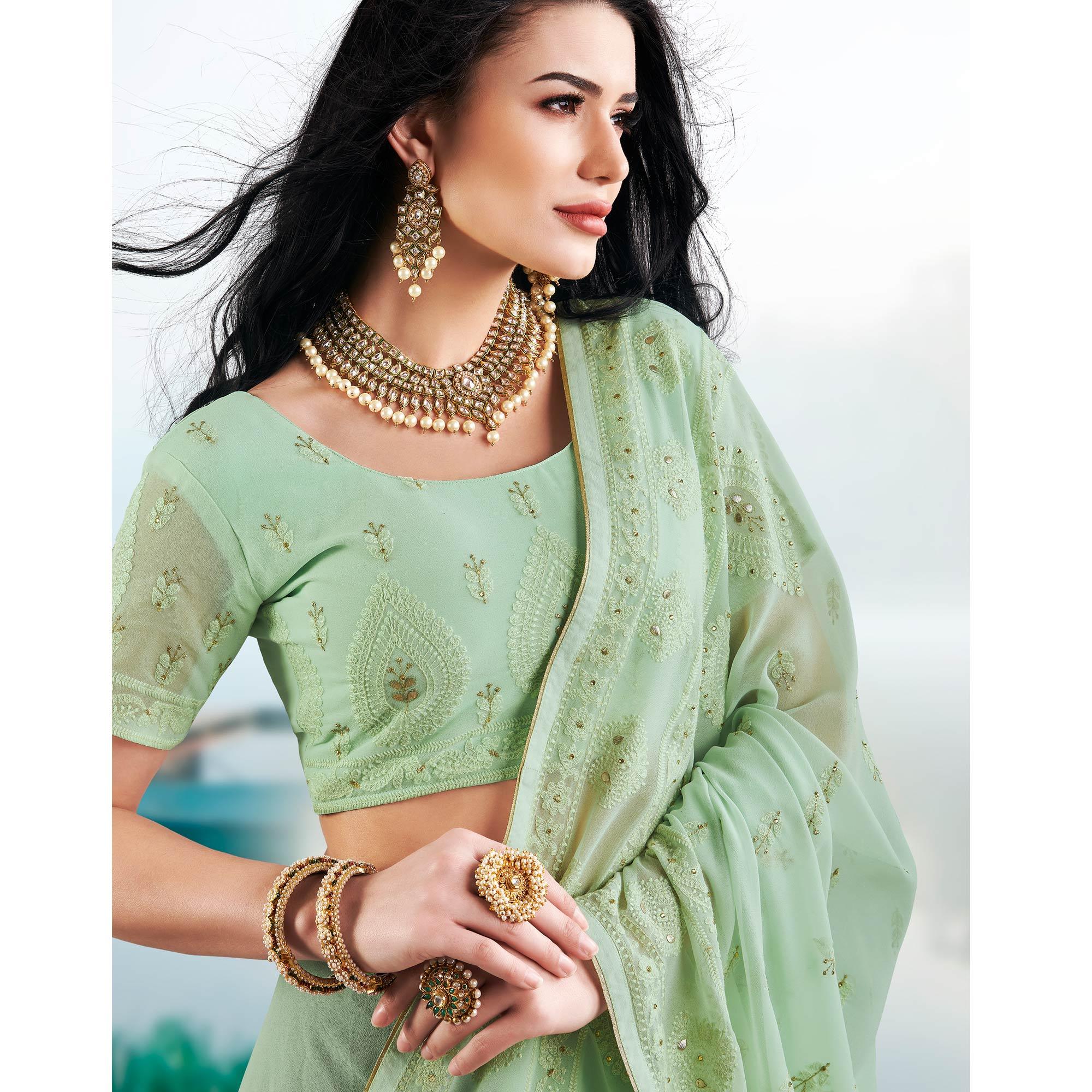 Hypnotic Pista Green Colored Partywear Embroidered Georgette Saree - Peachmode