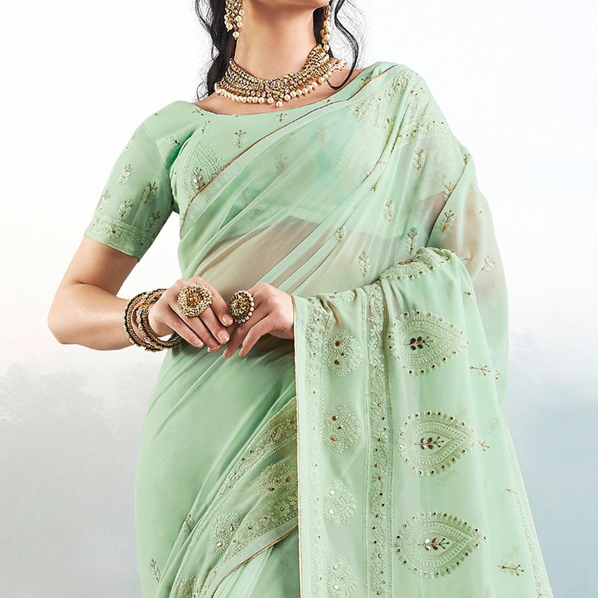 Hypnotic Pista Green Colored Partywear Embroidered Georgette Saree - Peachmode