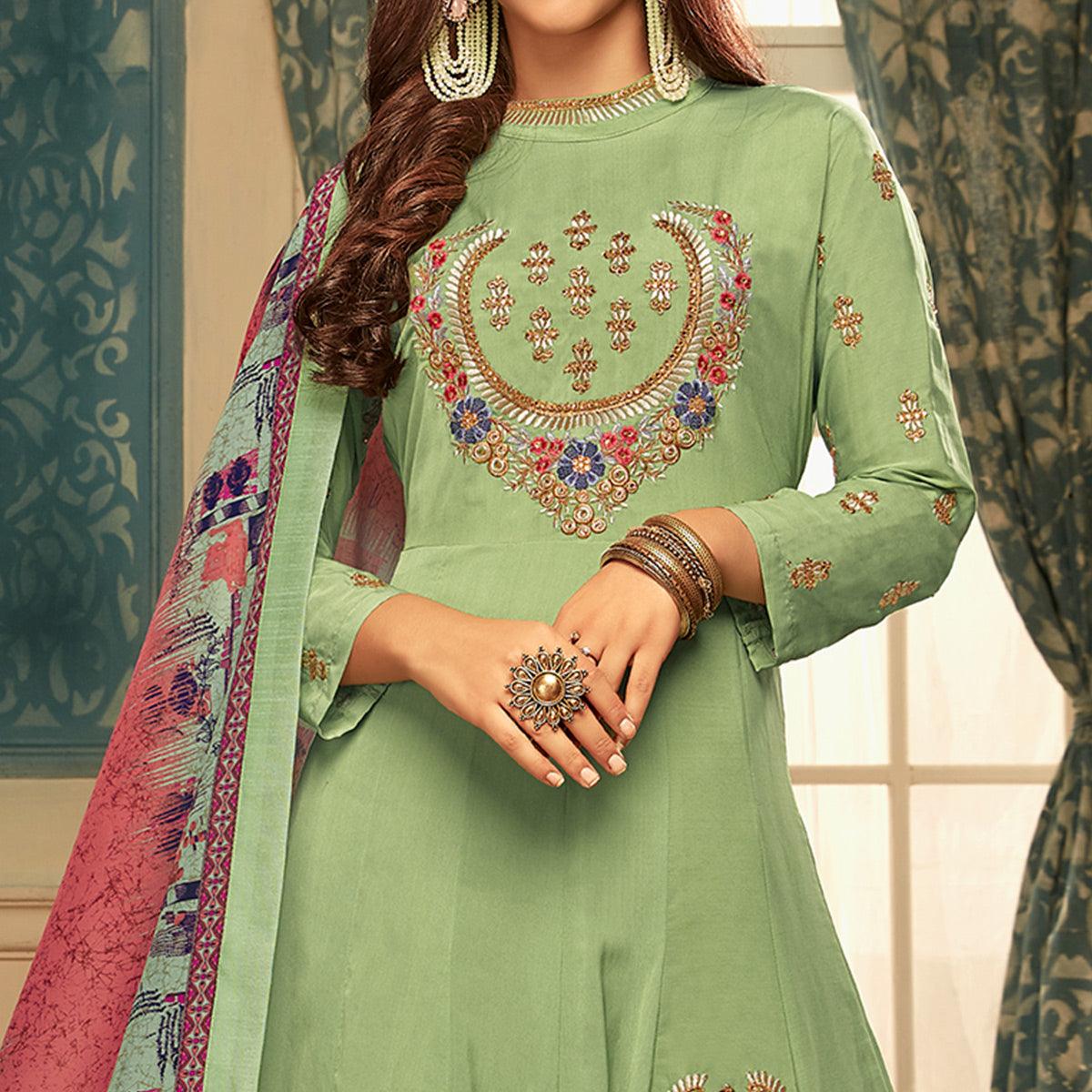 Hypnotic Pista Green Colored Partywear Embroidered Heavy Muslin Gown - Peachmode