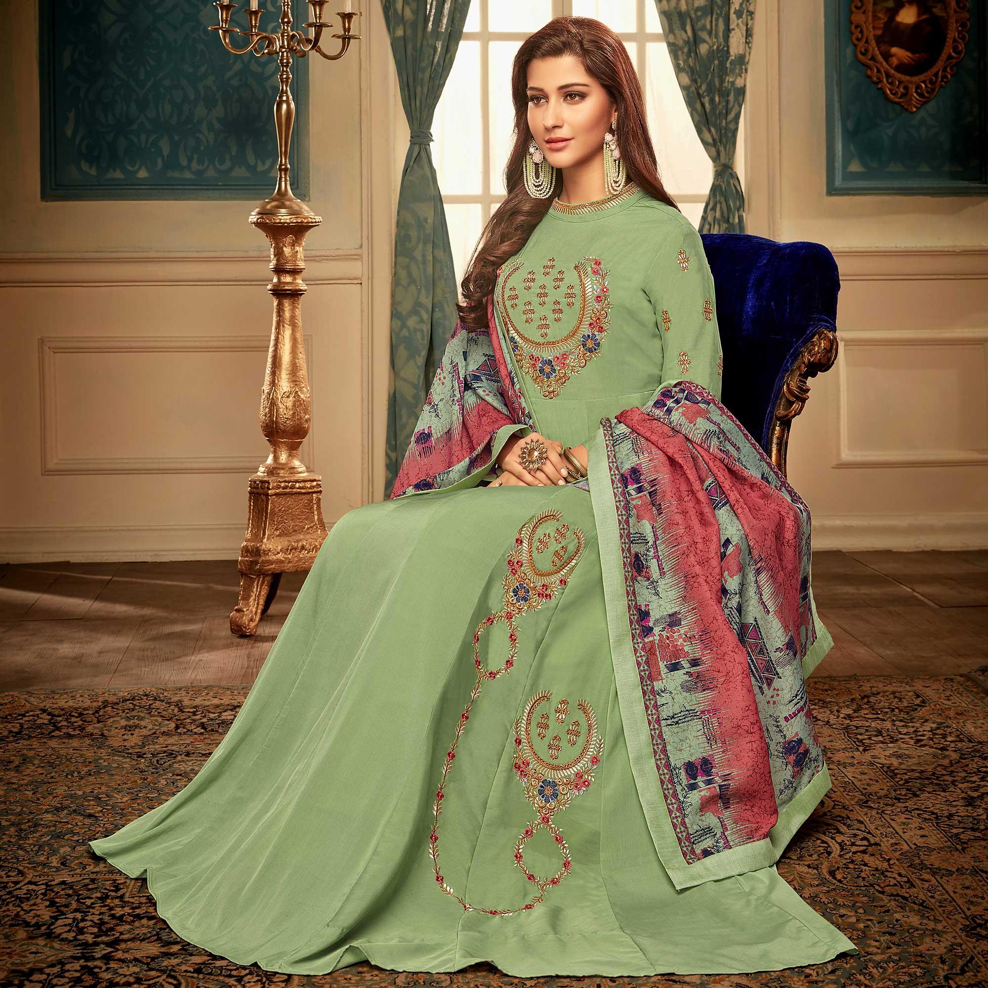 Hypnotic Pista Green Colored Partywear Embroidered Heavy Muslin Gown - Peachmode
