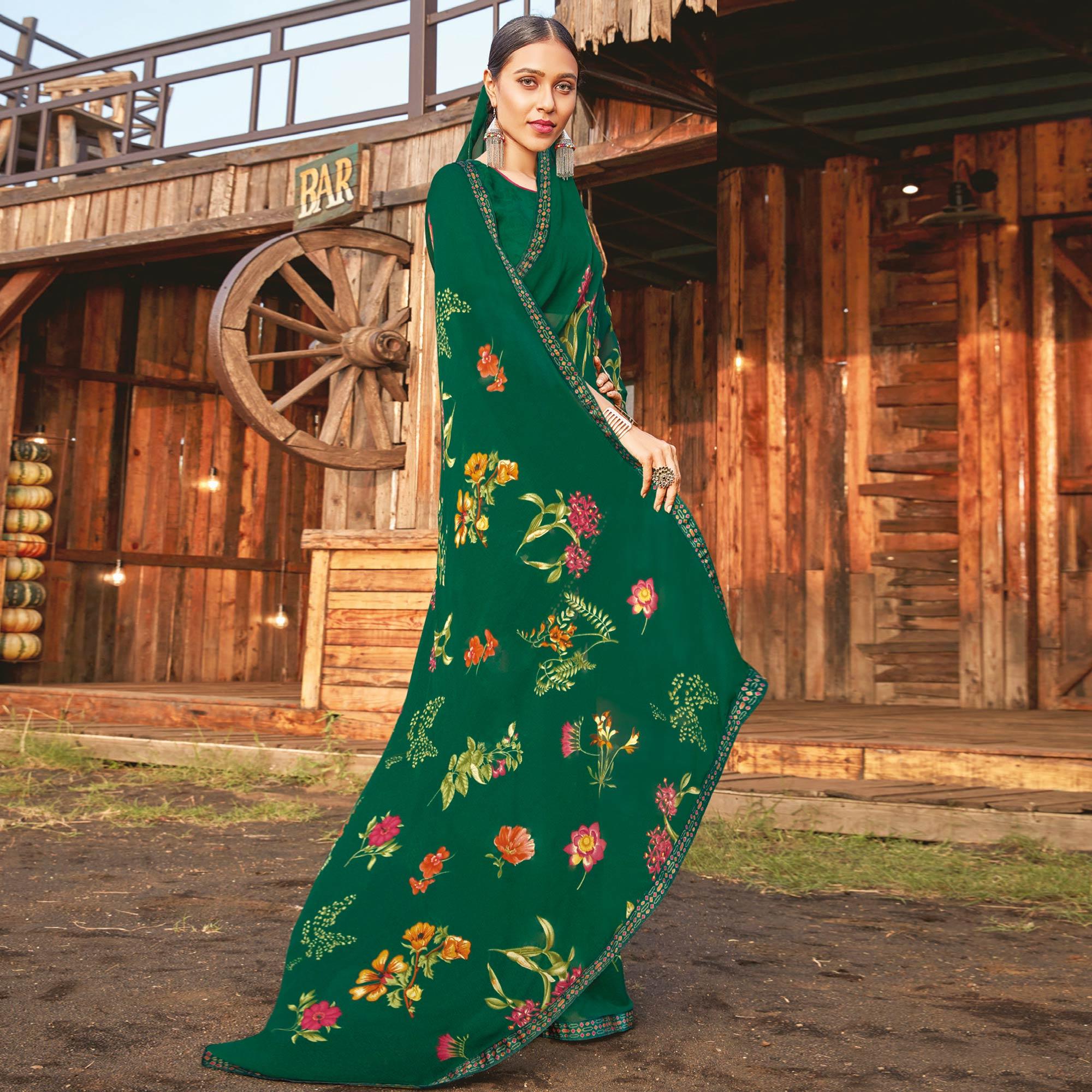 Ideal Bottle Green Coloured Partywear Pure Georgette Floral Printed Saree With Fancy Lace Border - Peachmode