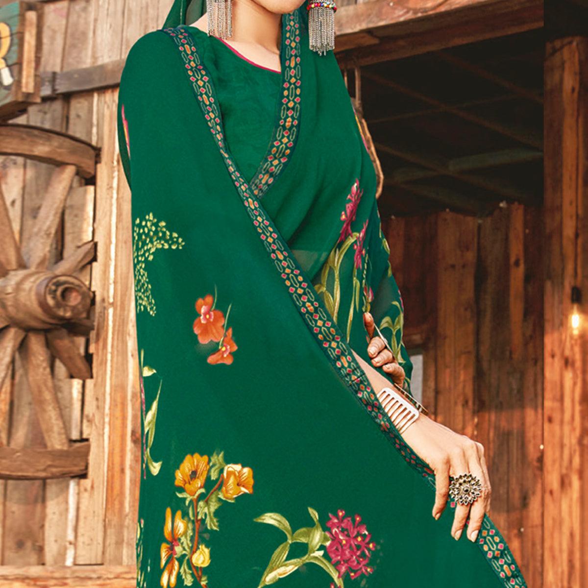 Ideal Bottle Green Coloured Partywear Pure Georgette Floral Printed Saree With Fancy Lace Border - Peachmode
