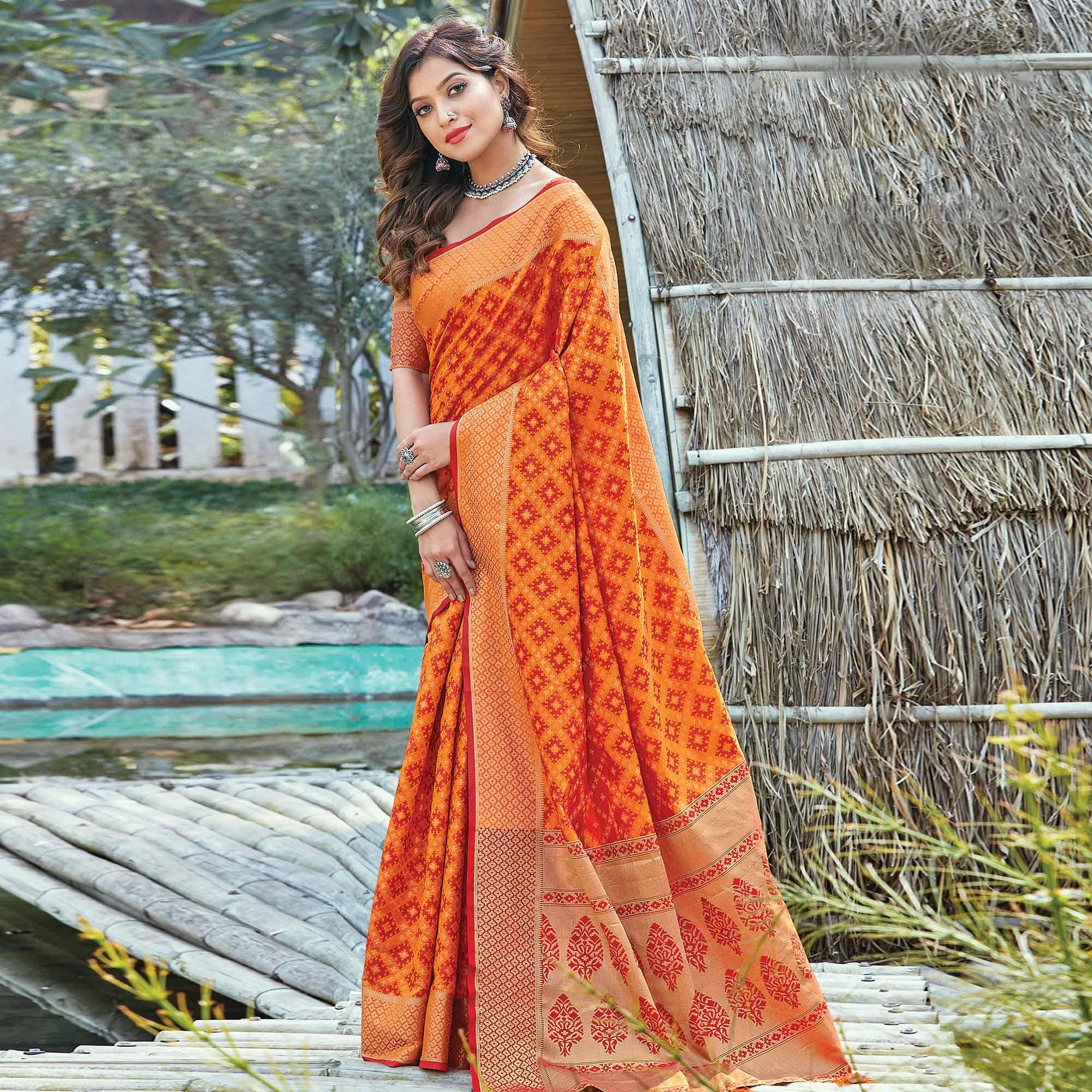 Ideal Orange Colored Festive Wear Patan Patola Silk Saree - Peachmode