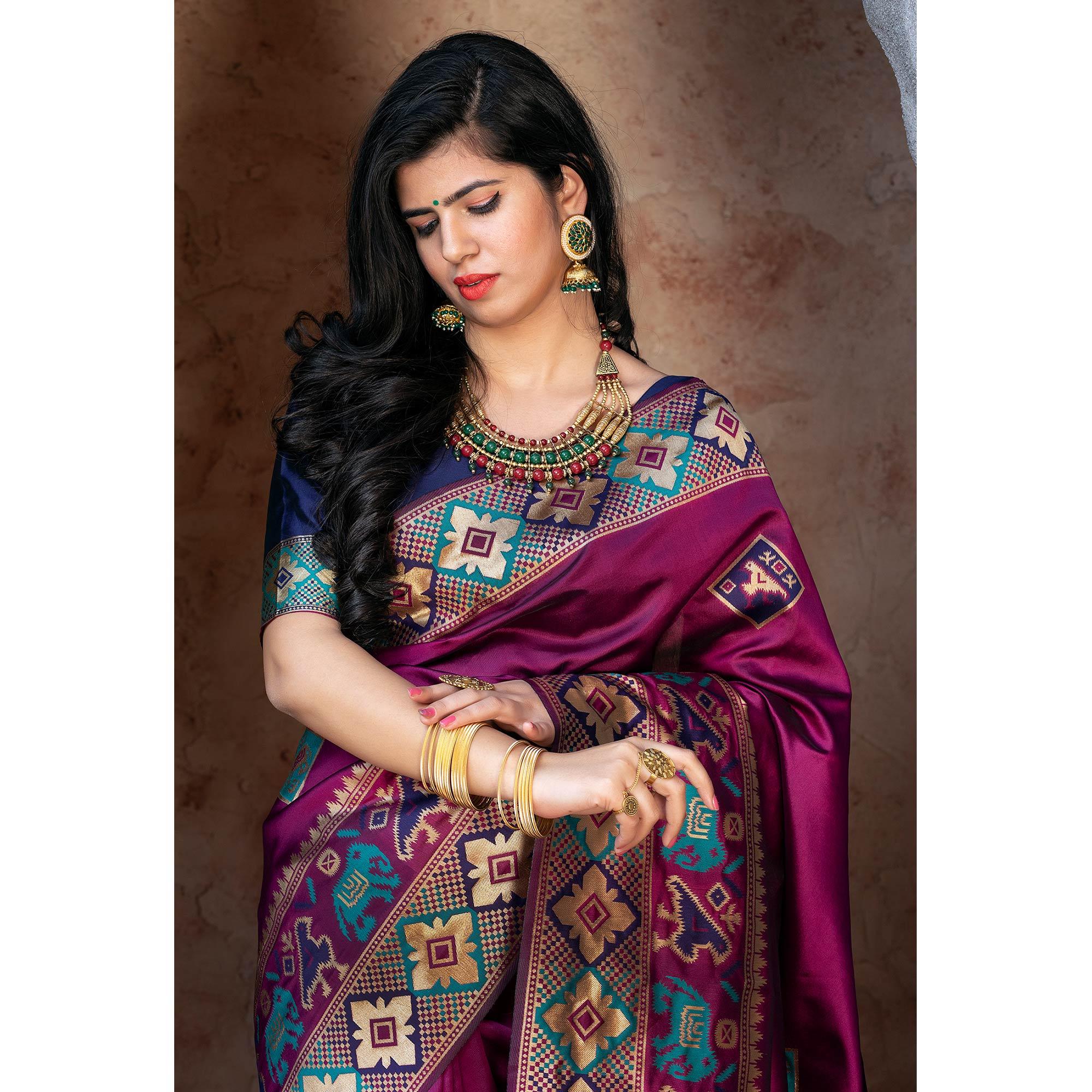 Ideal Purple Colored Festive Wear Woven Patola Silk Saree - Peachmode