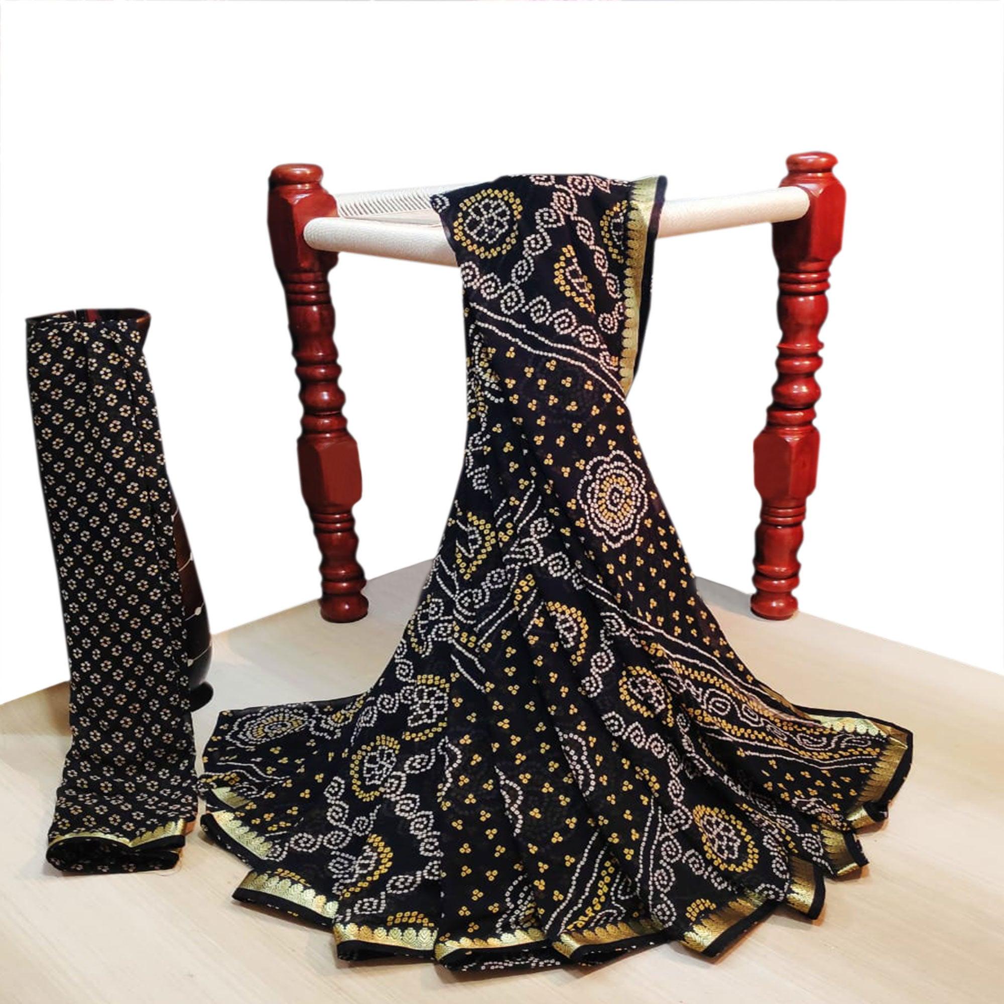 Imposing Black Colored Casual Wear Bandhani Printed Georgette Saree - Peachmode