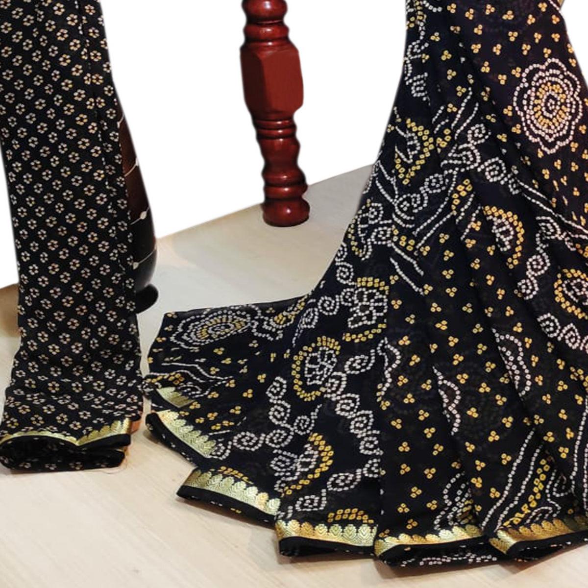 Imposing Black Colored Casual Wear Bandhani Printed Georgette Saree - Peachmode