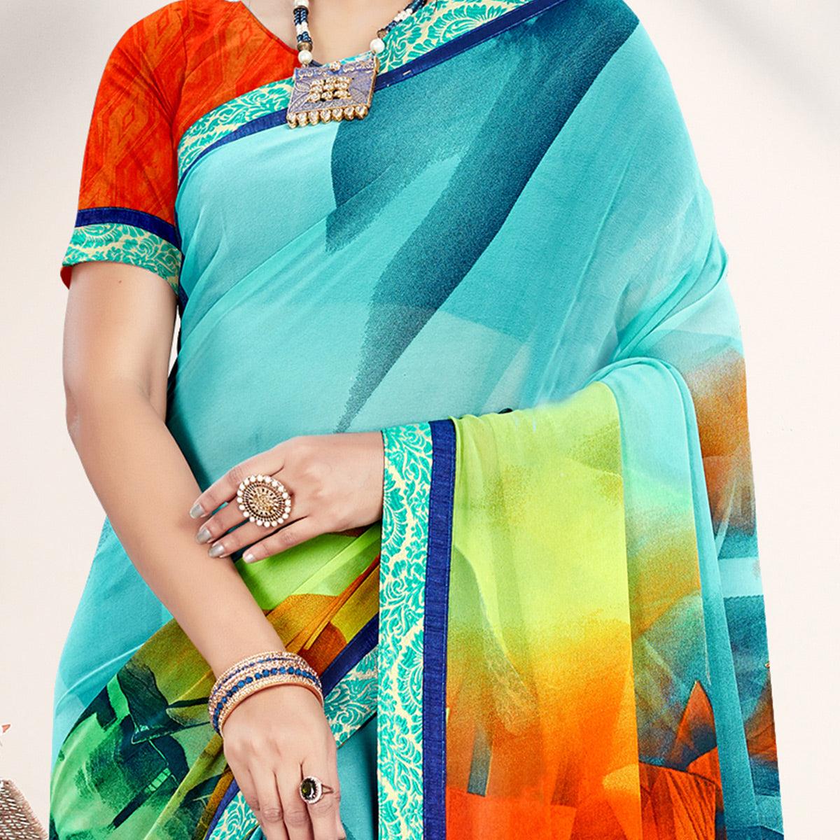 Imposing Blue Colored Casual Wear Printed Georgette Saree - Peachmode