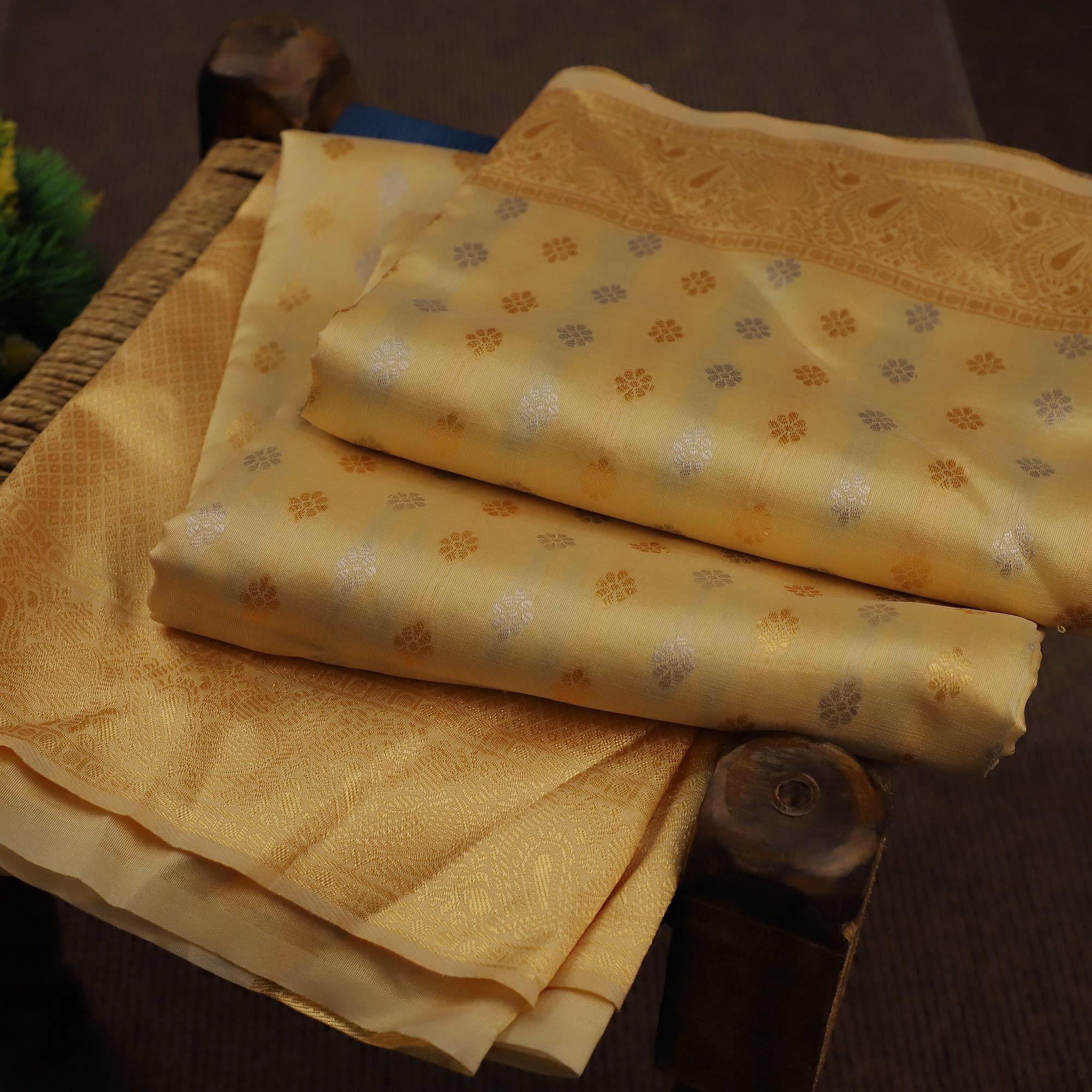 Imposing Cream Colored Festive Wear Woven Soft Silk Saree - Peachmode