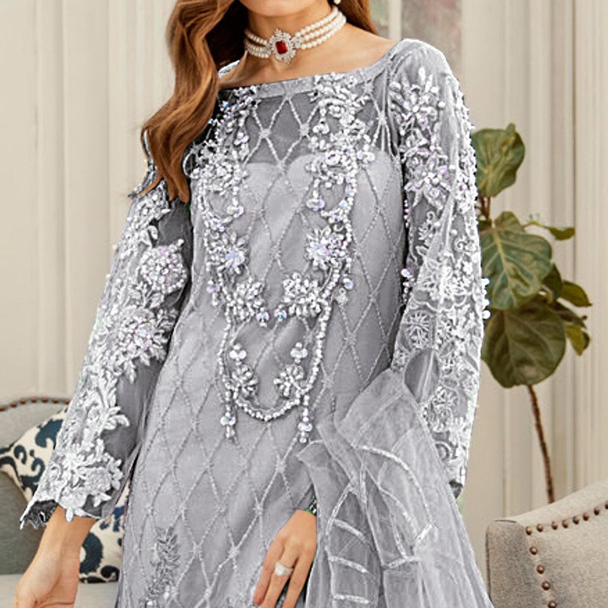 Imposing Grey Cololred Partywear Embroidered Net Palazzo Suit - Peachmode