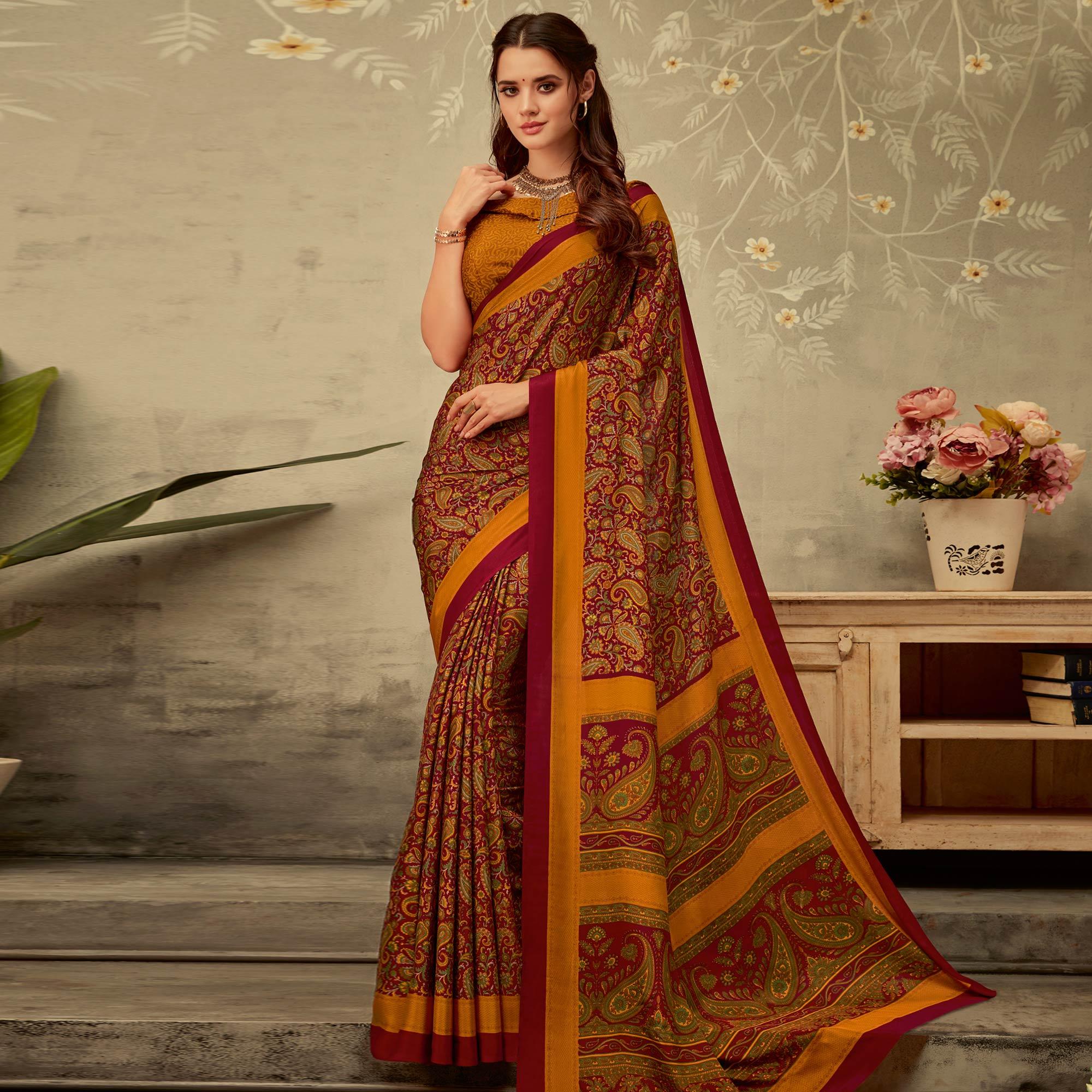 Imposing Maroon-Yellow Colored Partywear Printed Crepe Saree - Peachmode