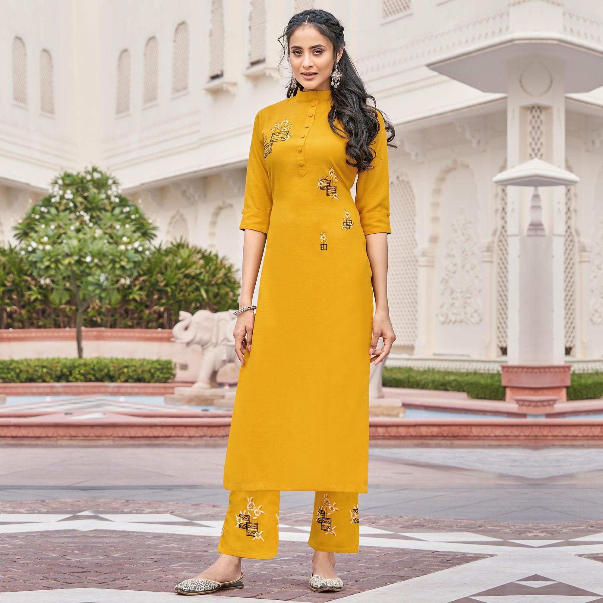 Imposing Mutard Yellow Colored Partywear Embroidered Cotton Slub Kurti Palazzo Set - Peachmode