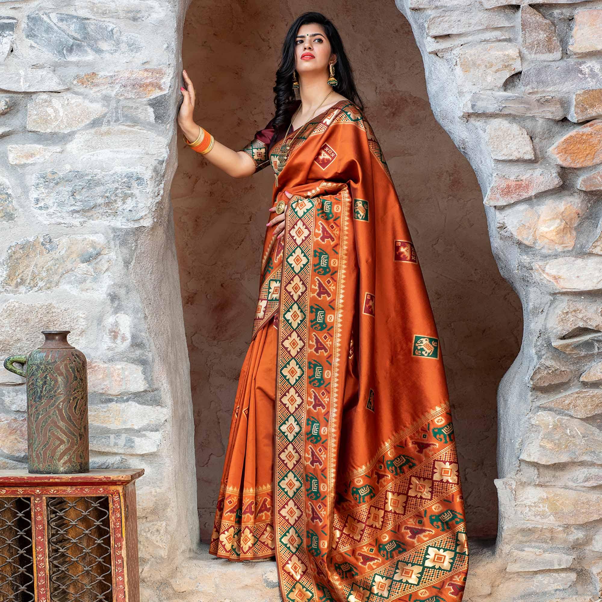 Imposing Orange Colored Festive Wear Woven Patola Silk Saree - Peachmode