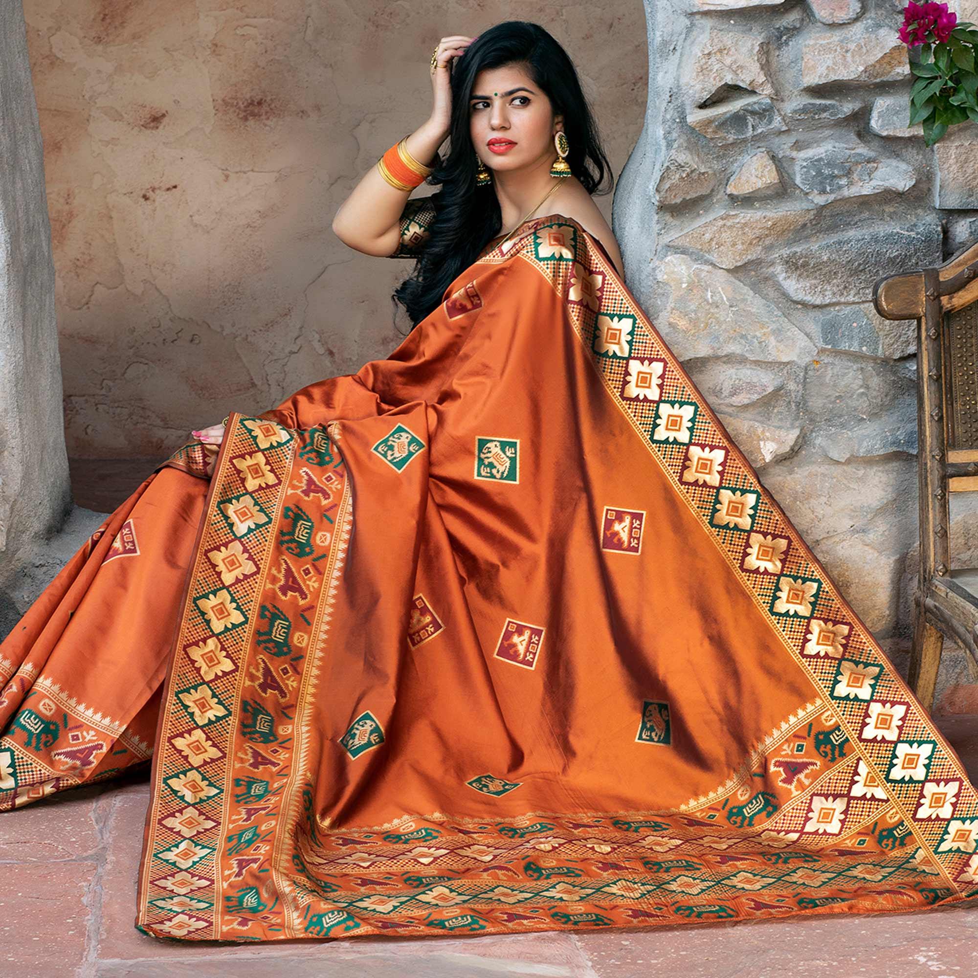 Imposing Orange Colored Festive Wear Woven Patola Silk Saree - Peachmode