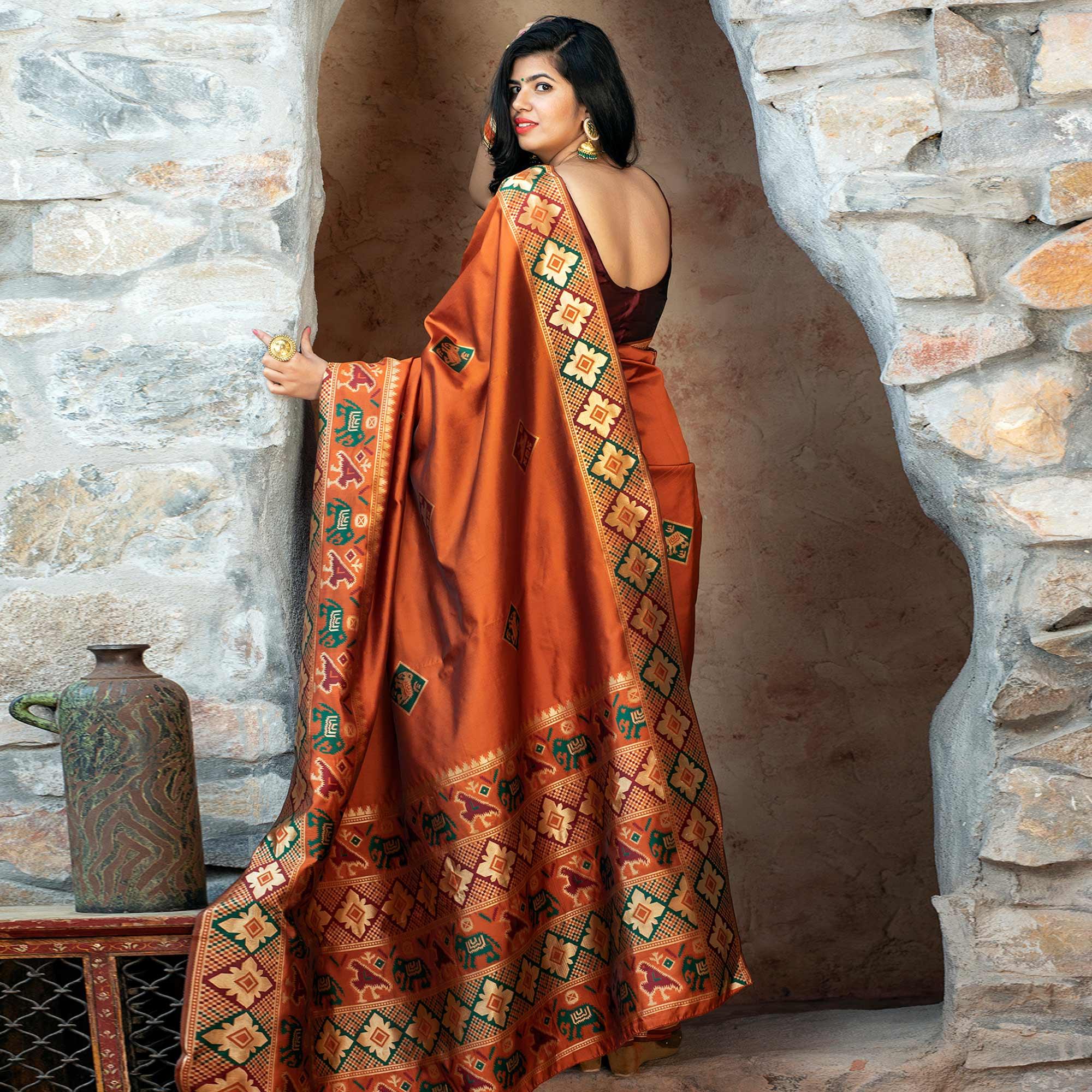 Imposing Orange Colored Festive Wear Woven Patola Silk Saree - Peachmode