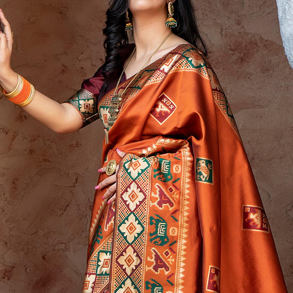 Imposing Orange Colored Festive Wear Woven Patola Silk Saree - Peachmode