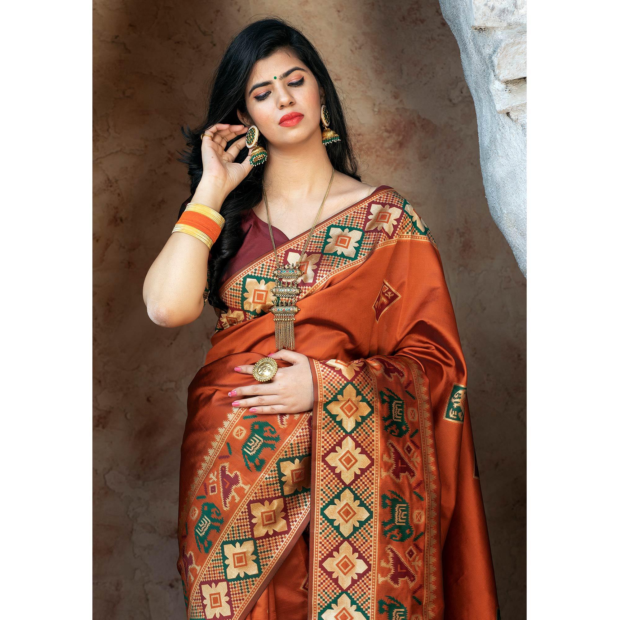 Imposing Orange Colored Festive Wear Woven Patola Silk Saree - Peachmode