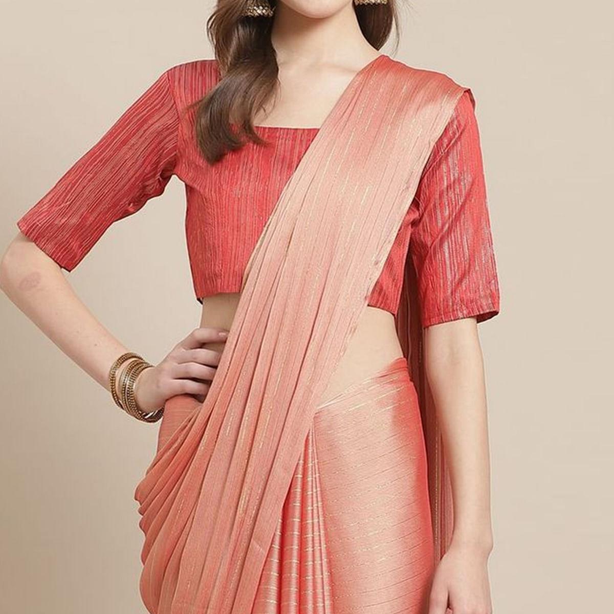 Imposing Peach Colored Casual Wear Printed Poly Georgette Saree - Peachmode