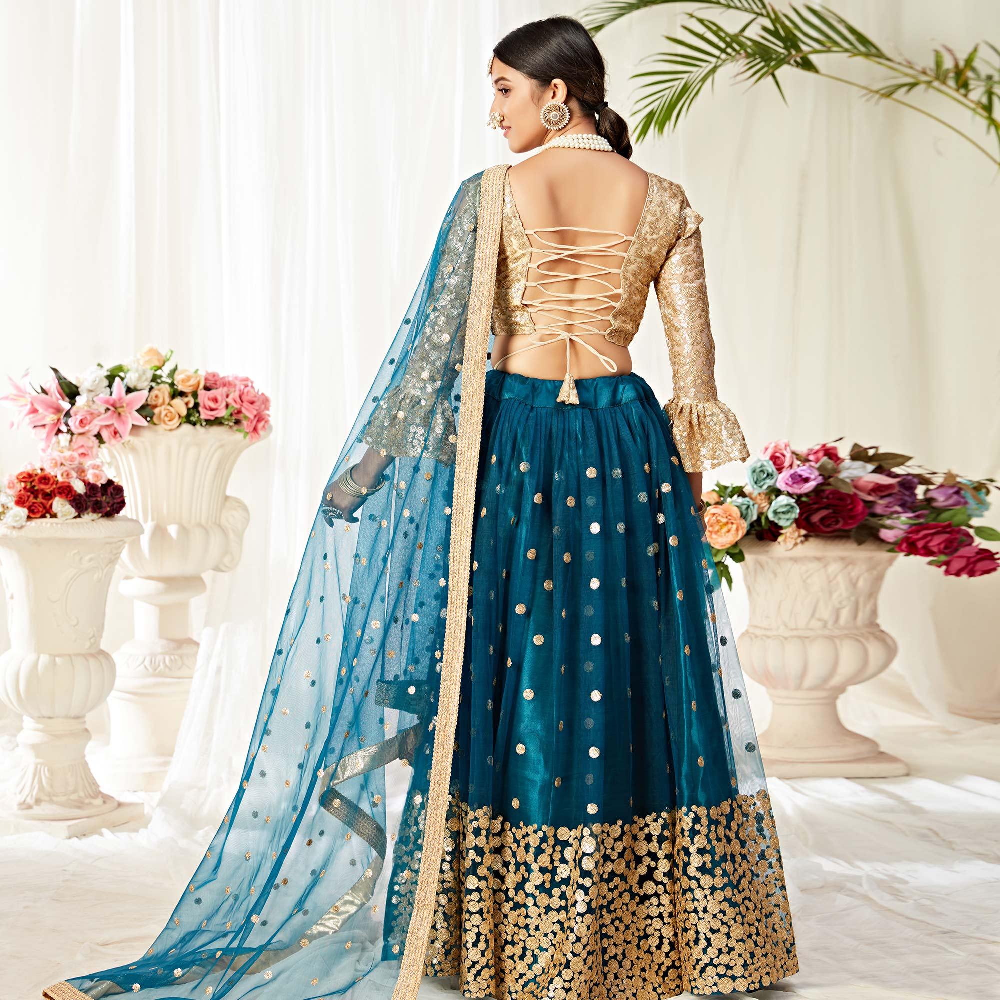 Imposing Peacock Blue Colored Wedding Wear Embroidered Heavy Net Lehenga Choli - Peachmode