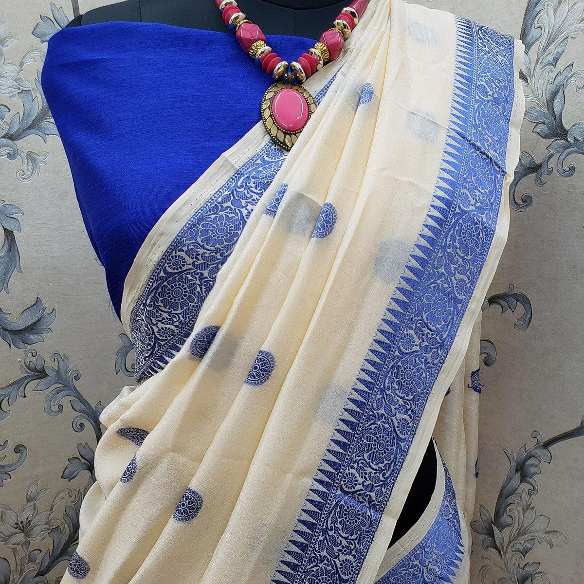 Impressive Cream Colored Festive Wear Woven Vichitra Silk Saree - Peachmode