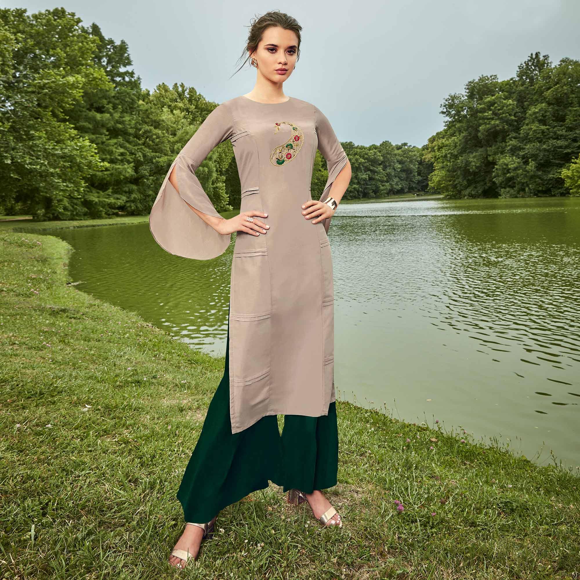 Impressive Light Grey Colored Partywear Hand Embroidered Muslin Silk Kurti-Palazzo Set - Peachmode