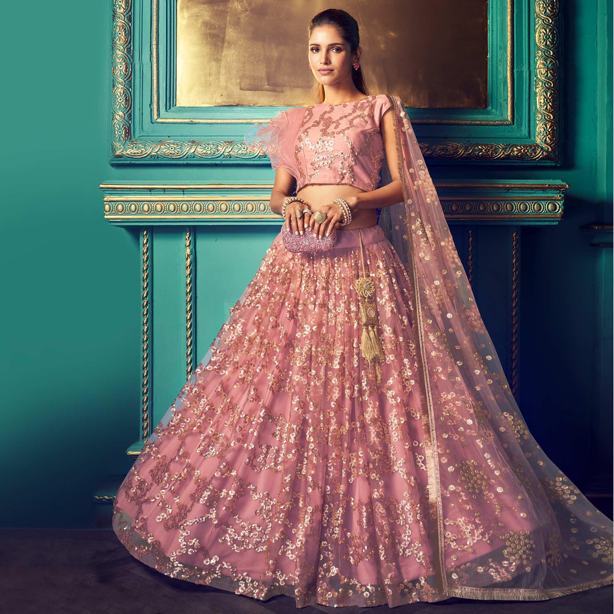 Impressive Purple Colored Partywear Embroidered Soft Net Lehenga Choli - Peachmode