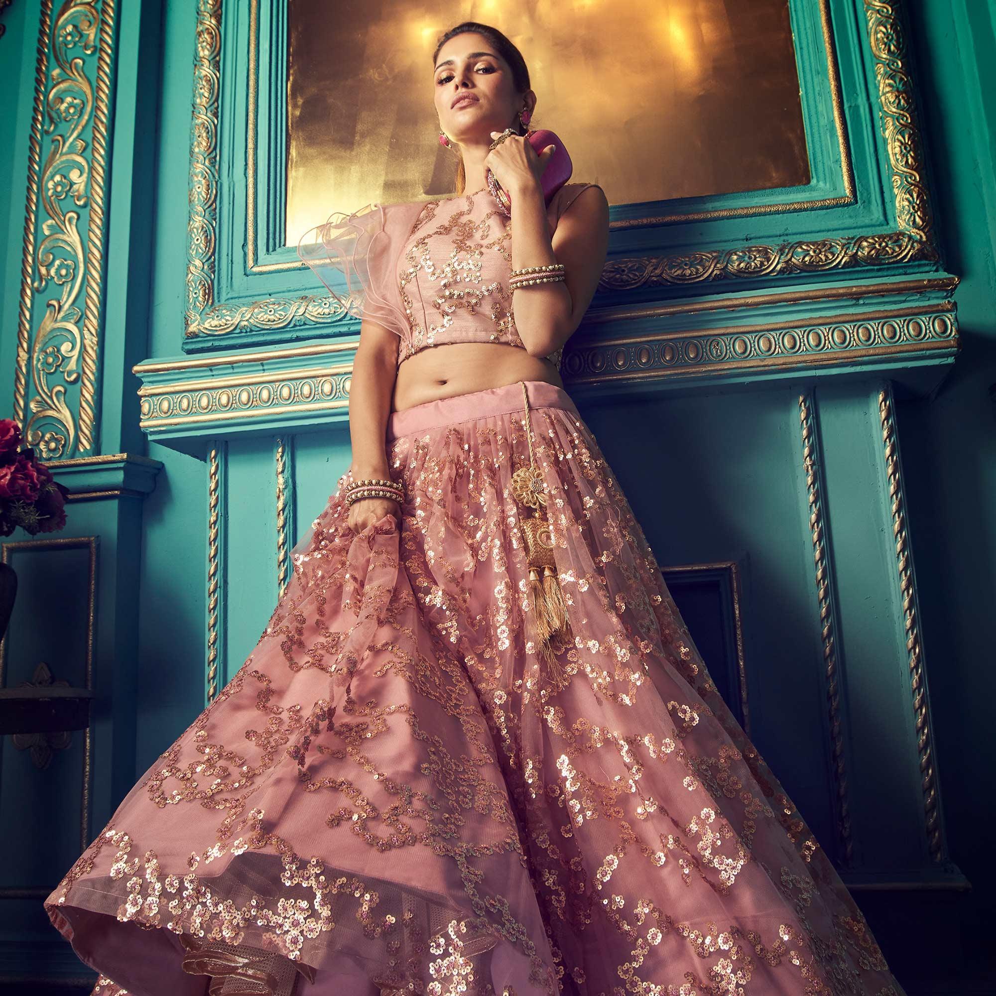 Impressive Purple Colored Partywear Embroidered Soft Net Lehenga Choli - Peachmode