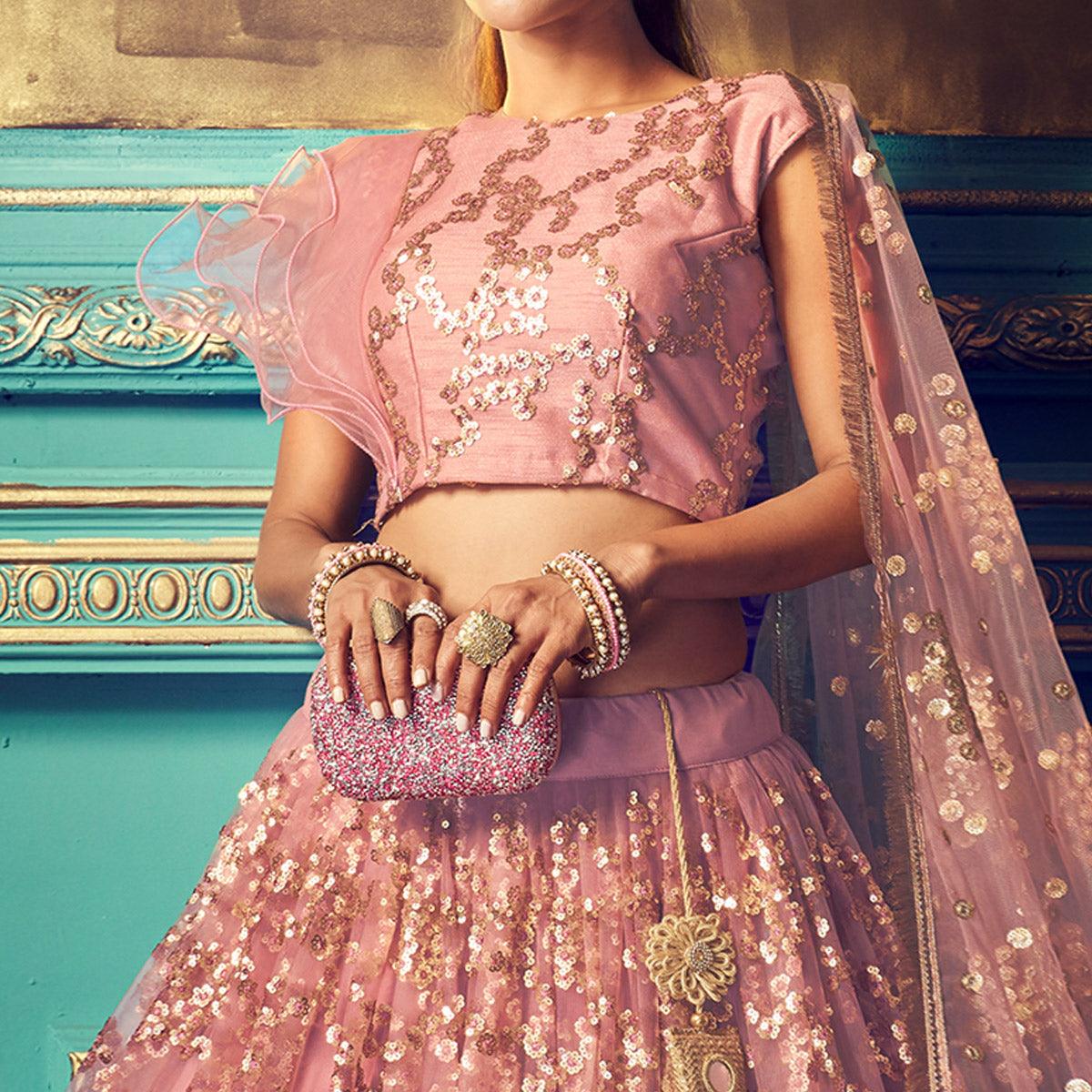 Impressive Purple Colored Partywear Embroidered Soft Net Lehenga Choli - Peachmode