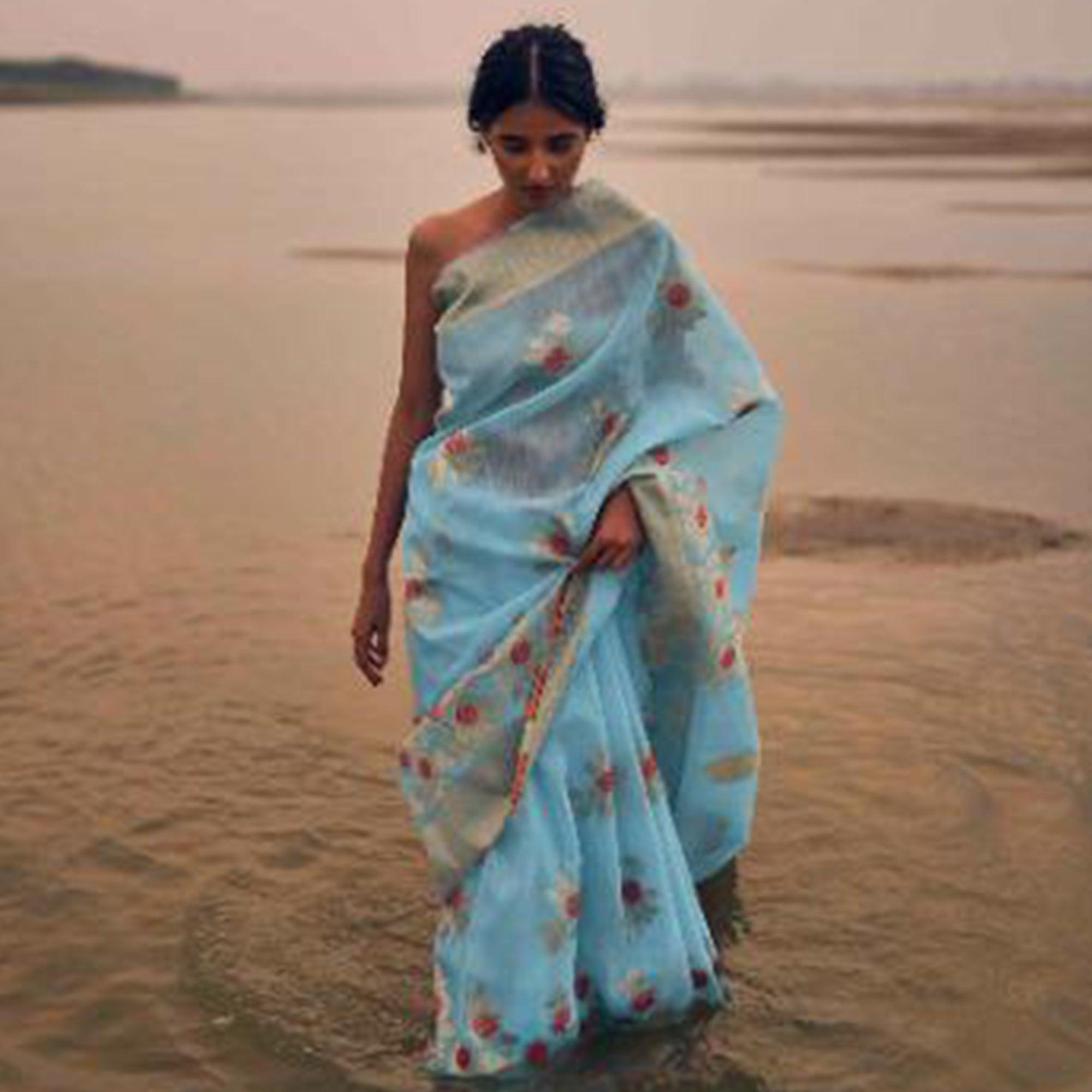 Impressive Sky Blue Colored Festive Wear Woven Pure Linen Silk Saree - Peachmode